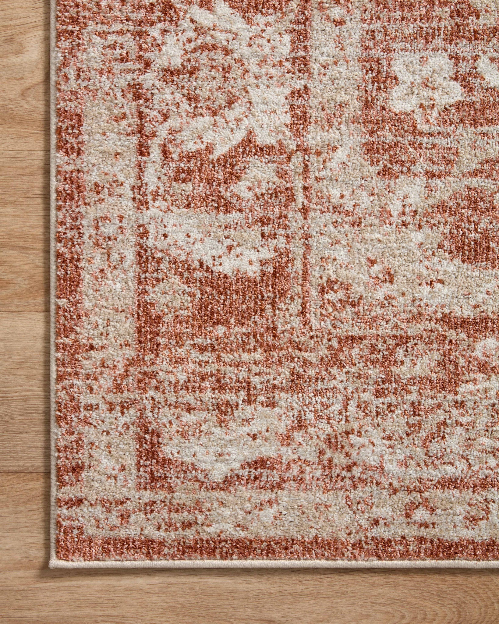 lifestyle view of Odette Rust / Ivory luxury Rug