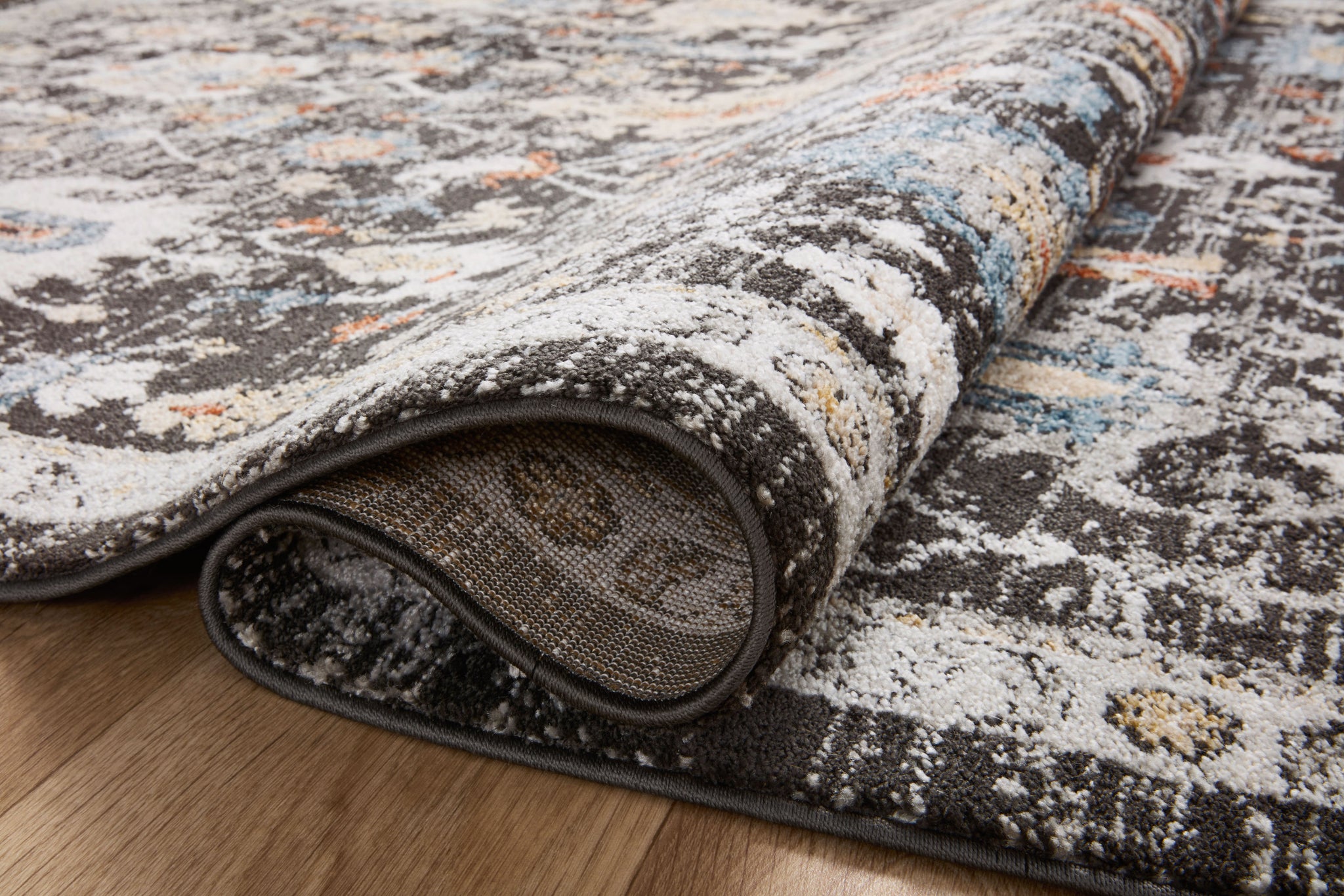detail view of Odette Charcoal / Multi luxury Rug