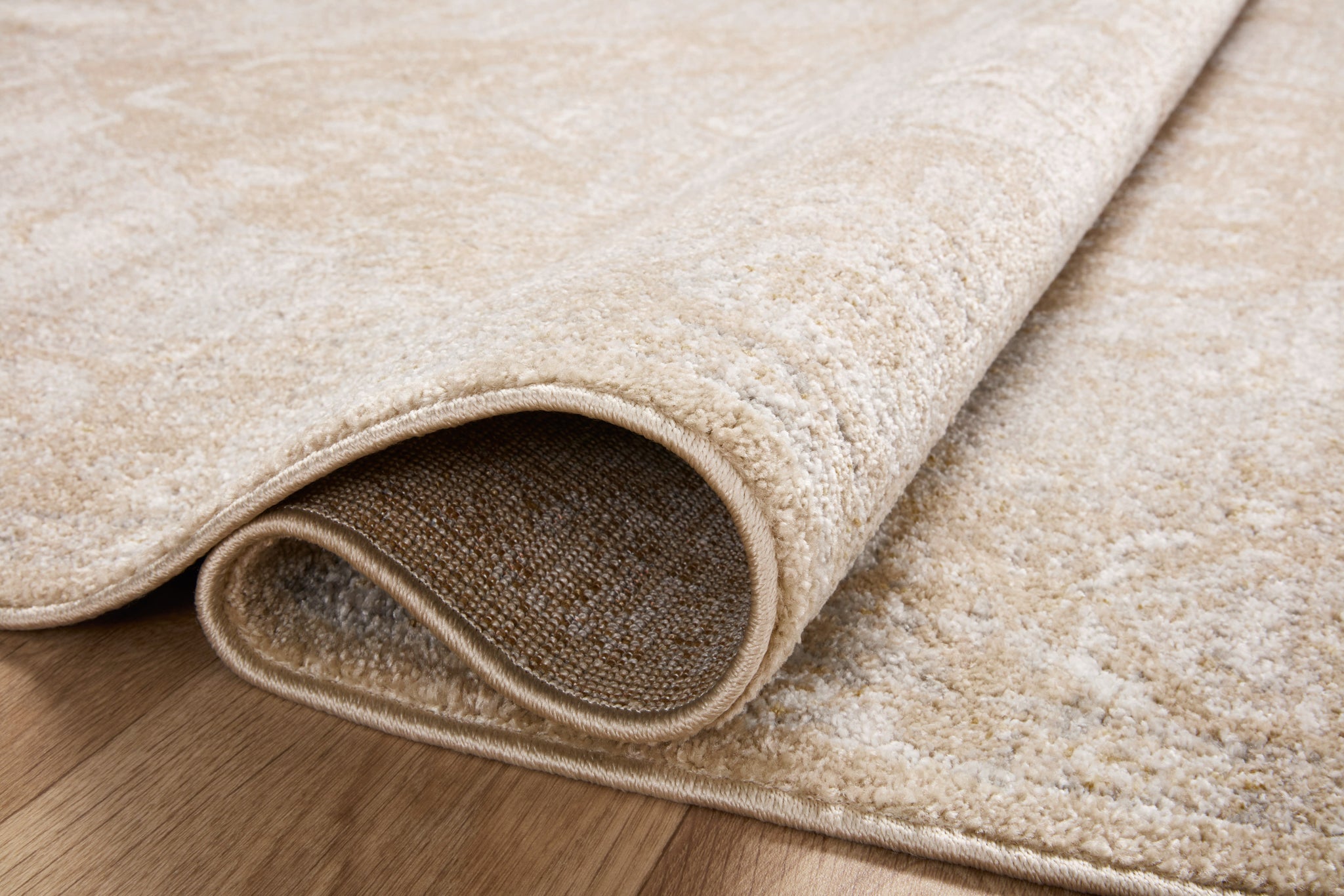 detail view of Odette Beige / Silver luxury Rug