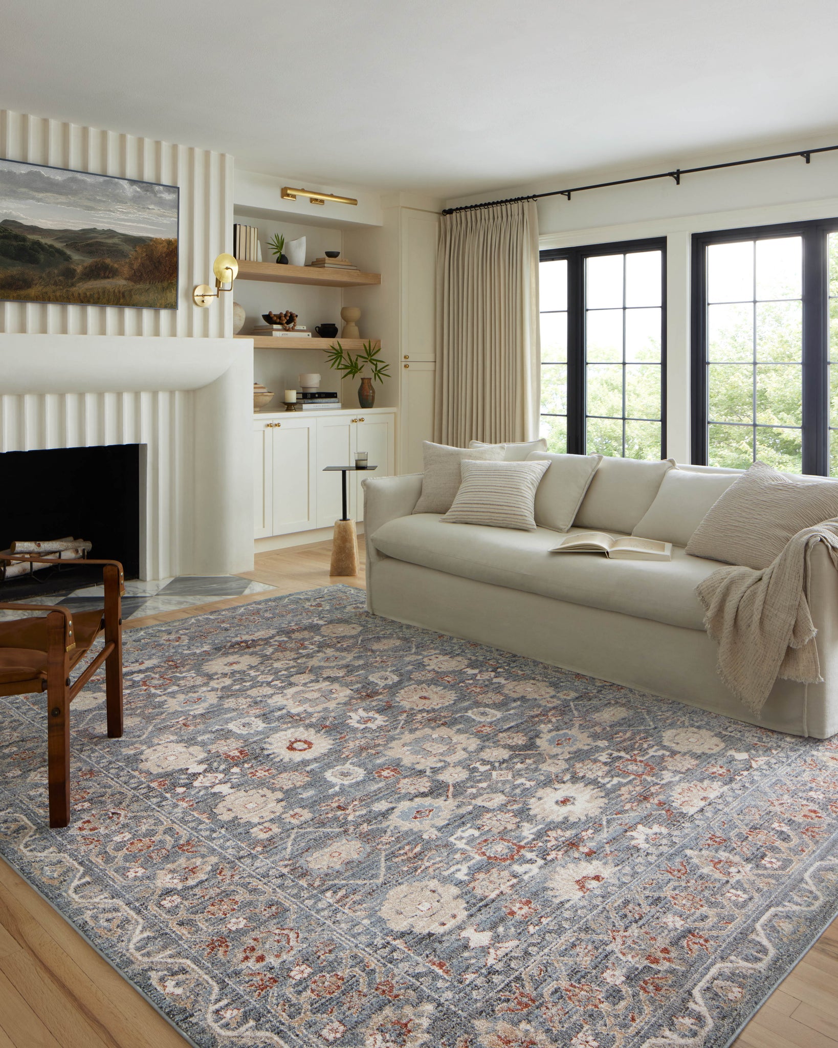 angle view of Odette Sky / Rust luxury Rug