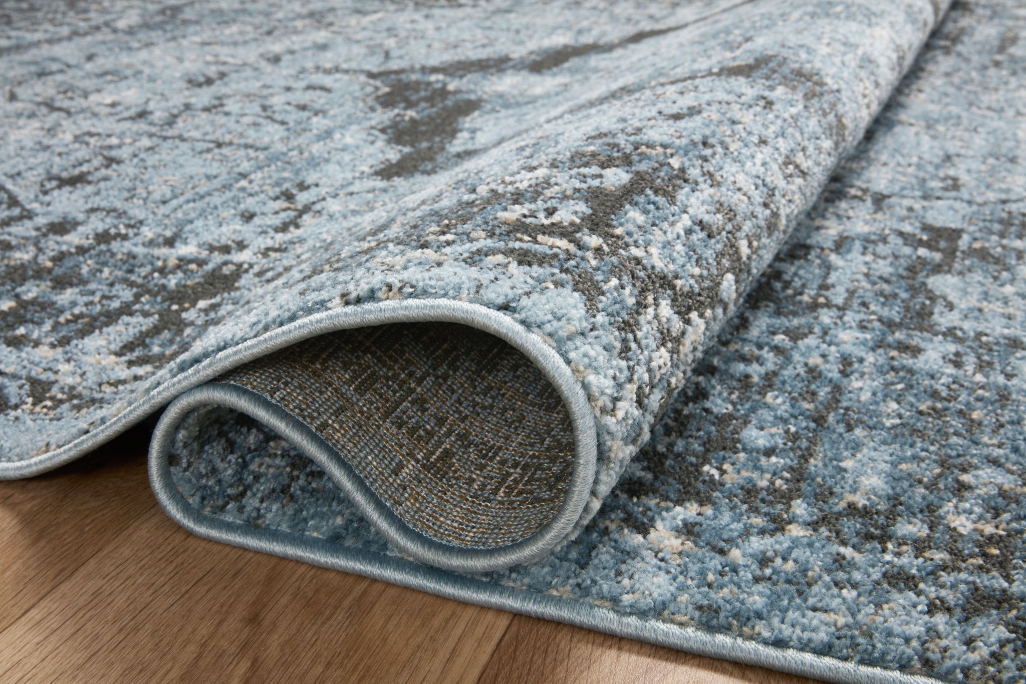 detail view of Odette Sky / Charcoal luxury Rug