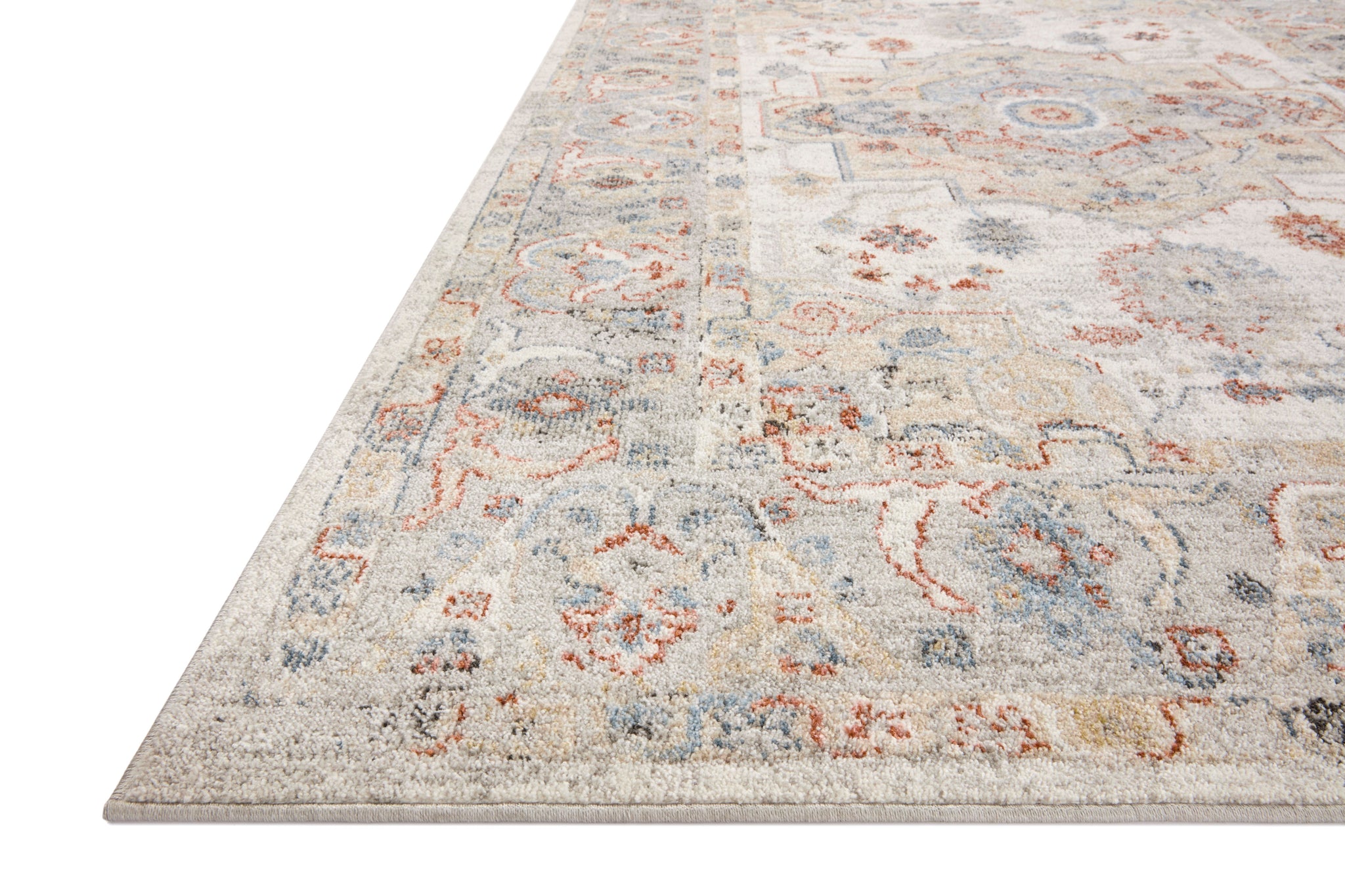 side view of Odette Ivory / Multi luxury Rug