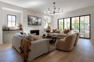 Orson Chandelier 41.5" styled in an elegant dining room for warm, layered light at Laurie Yapp Home.