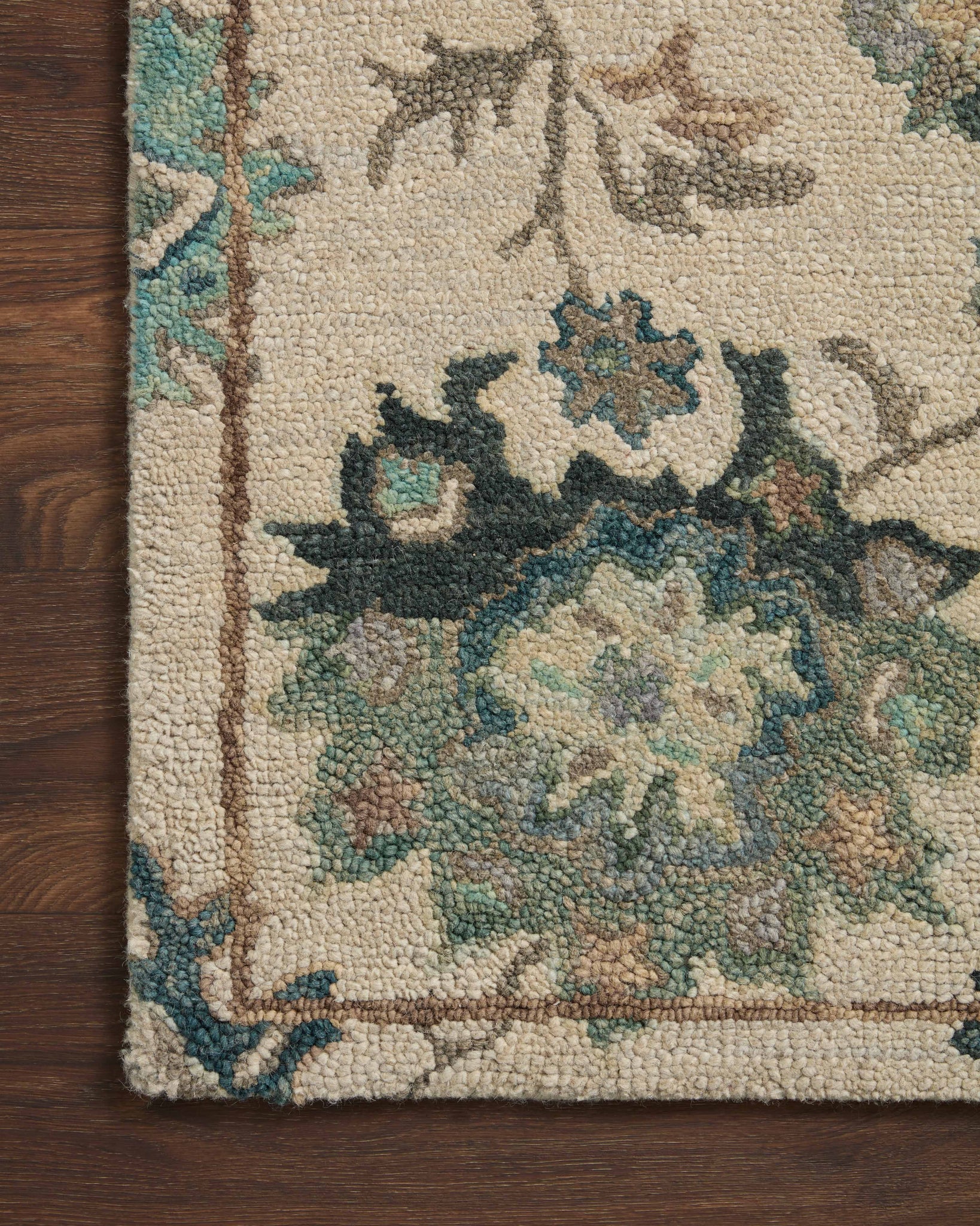 side view of Padma Ivory / Blue luxury Rug
