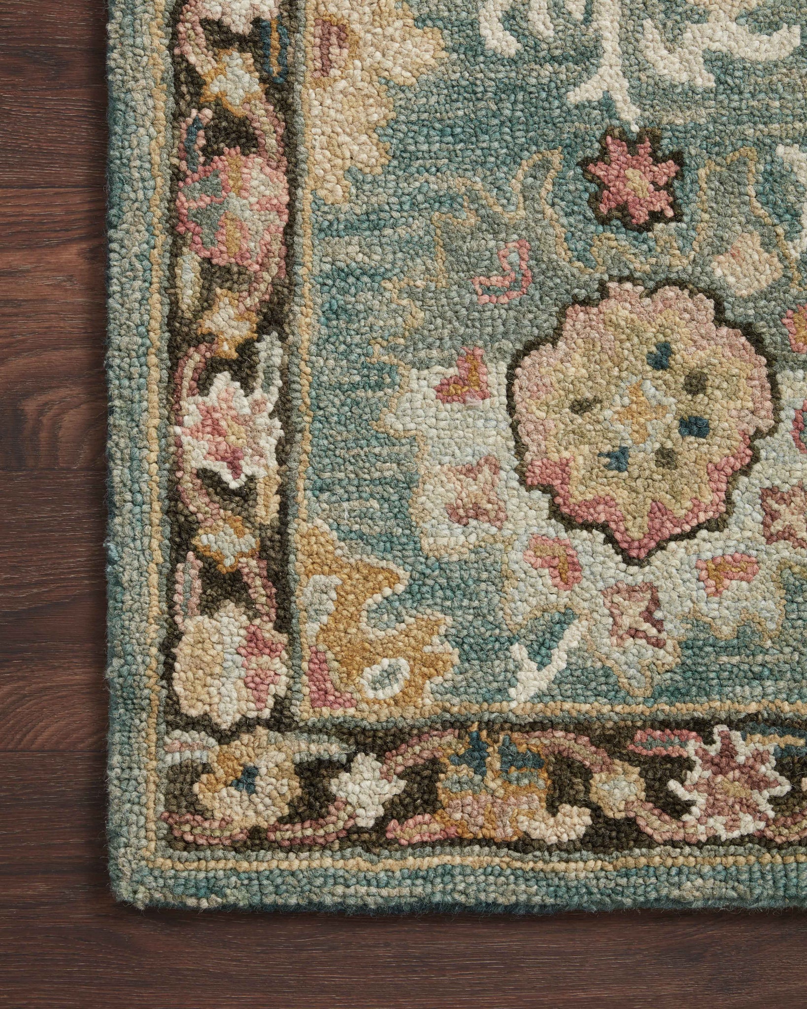 side view of Padma Teal / Multi luxury Rug