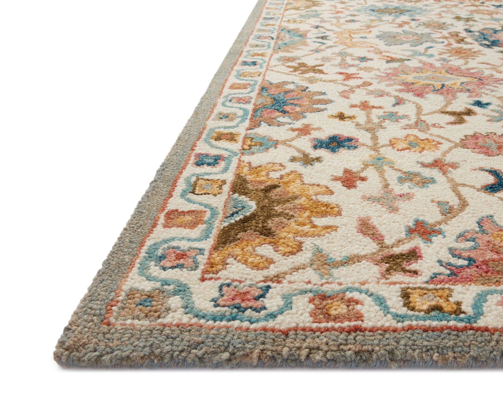 angle view of Padma Ivory / Multi luxury Rug
