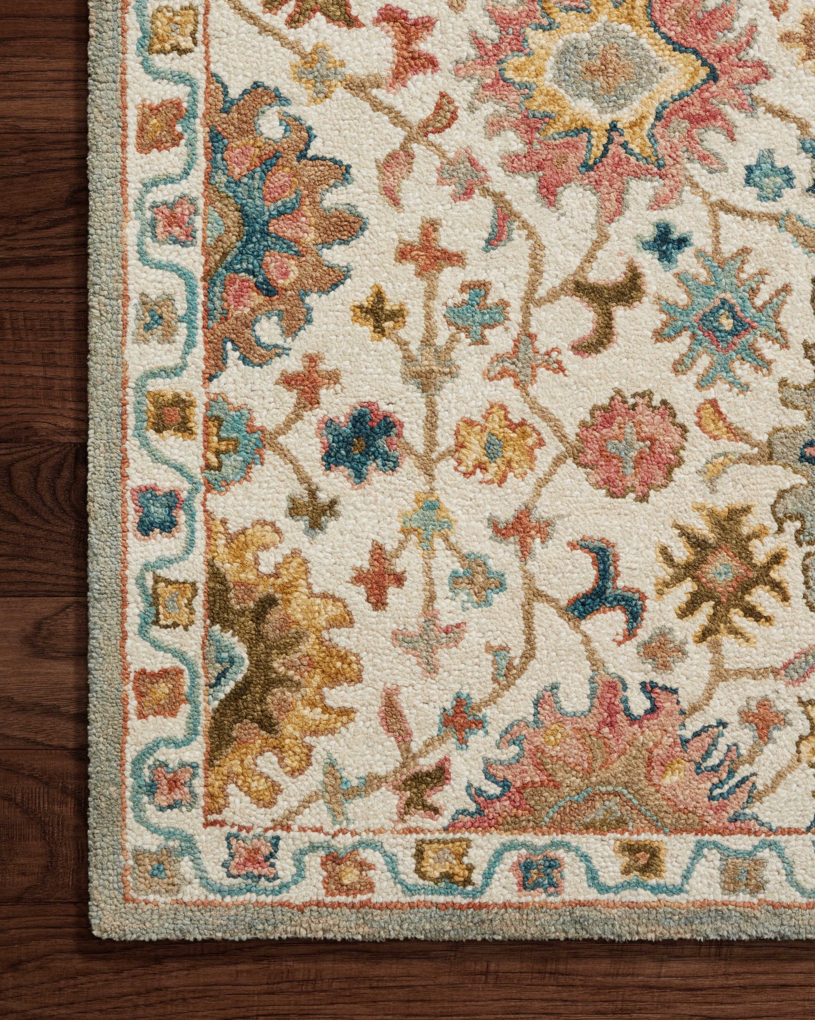 side view of Padma Ivory / Multi luxury Rug