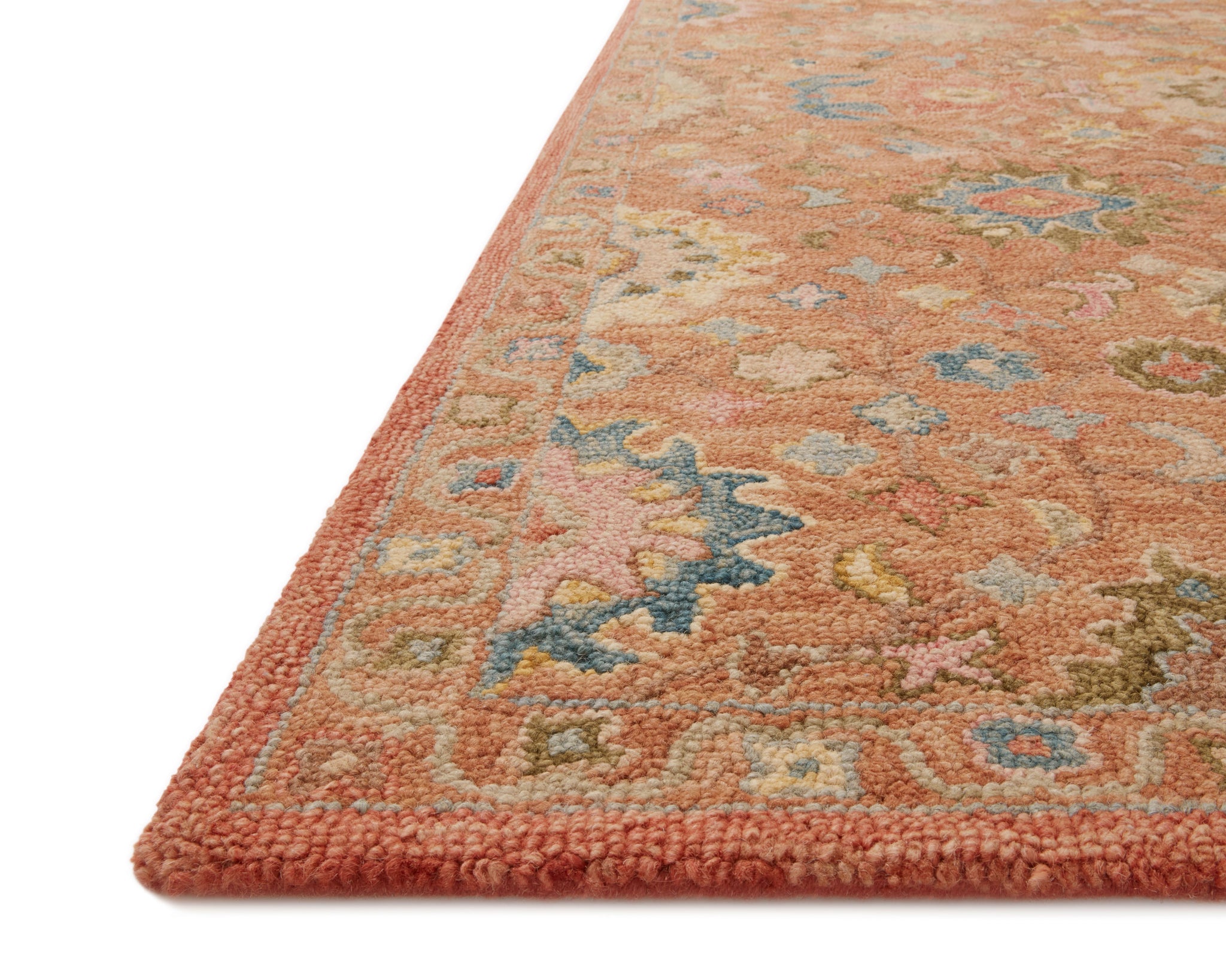 angle view of Padma Terracotta / Multi luxury Rug