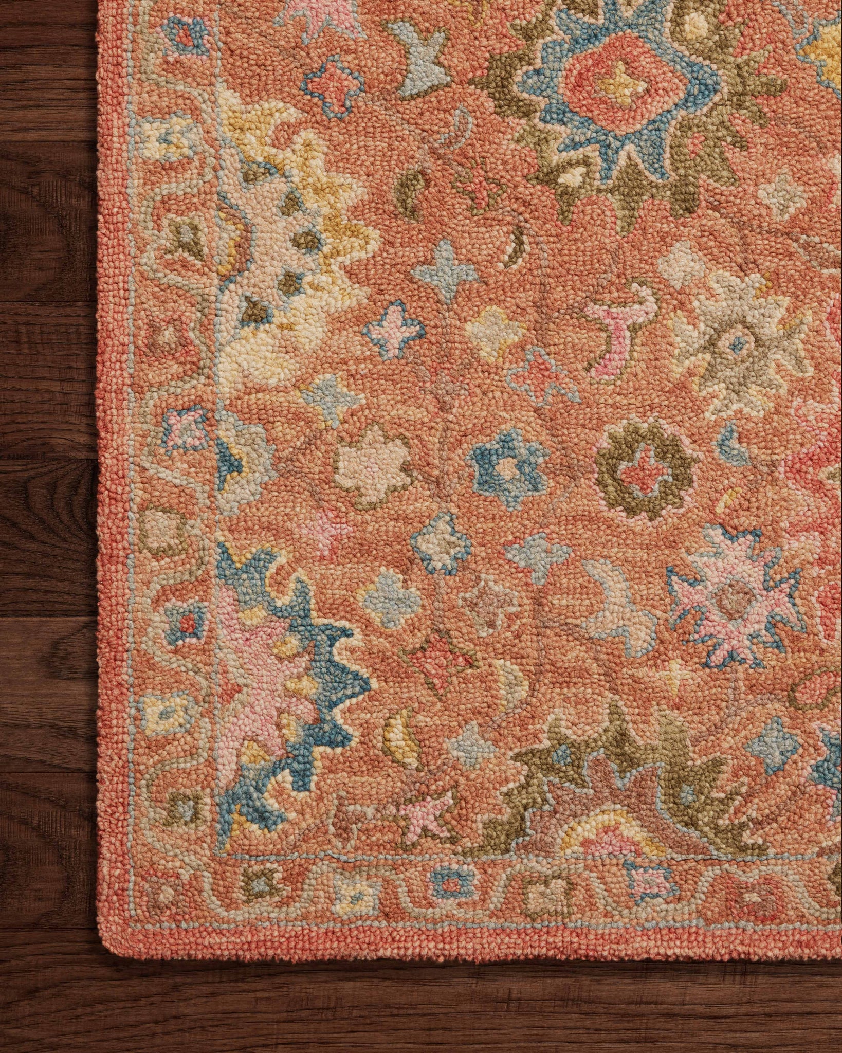 side view of Padma Terracotta / Multi luxury Rug