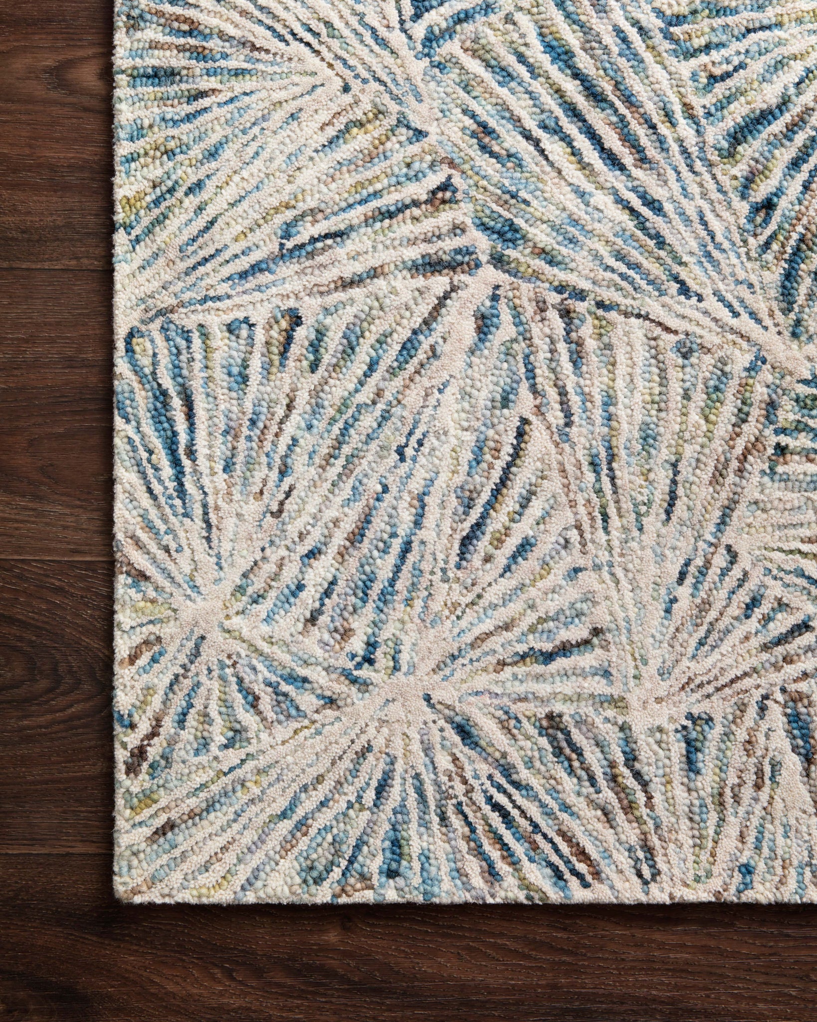 side view of Peregrine Lagoon luxury Rug