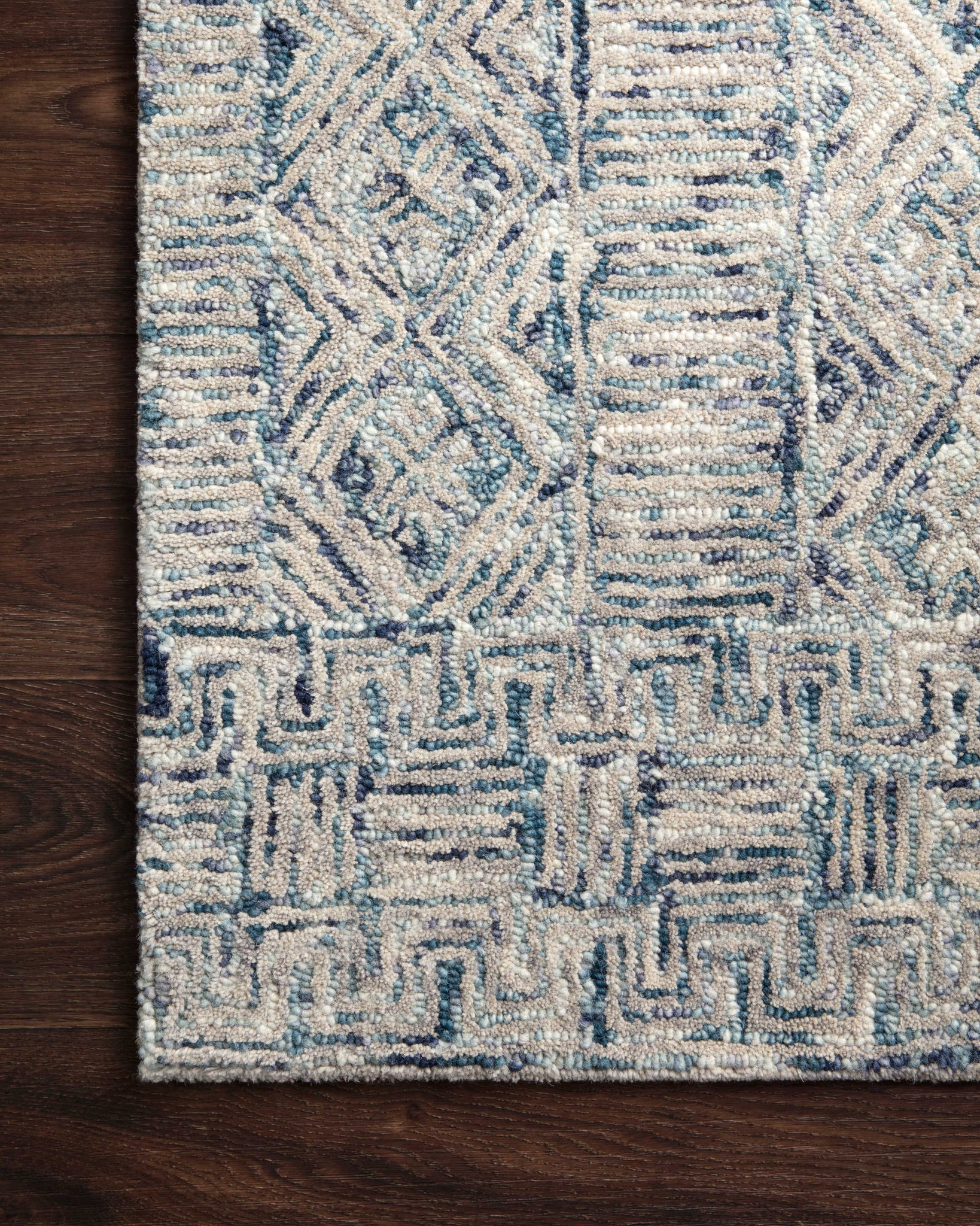 side view of Peregrine Ocean luxury Rug