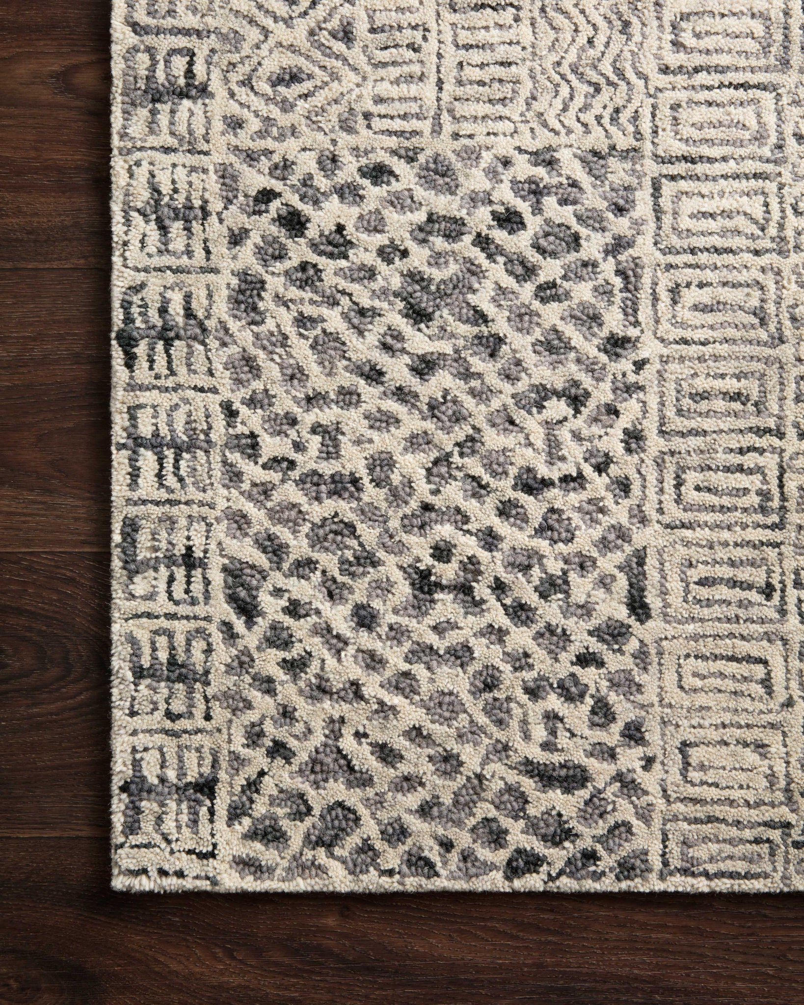 side view of Peregrine Charcoal luxury Rug