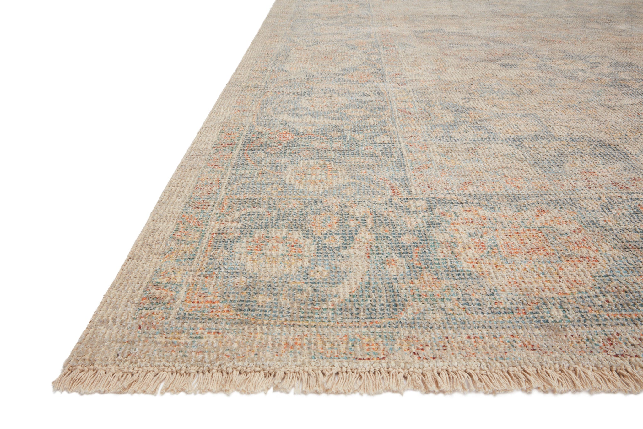 angle view of Priya Bone / Bluestone luxury Rug