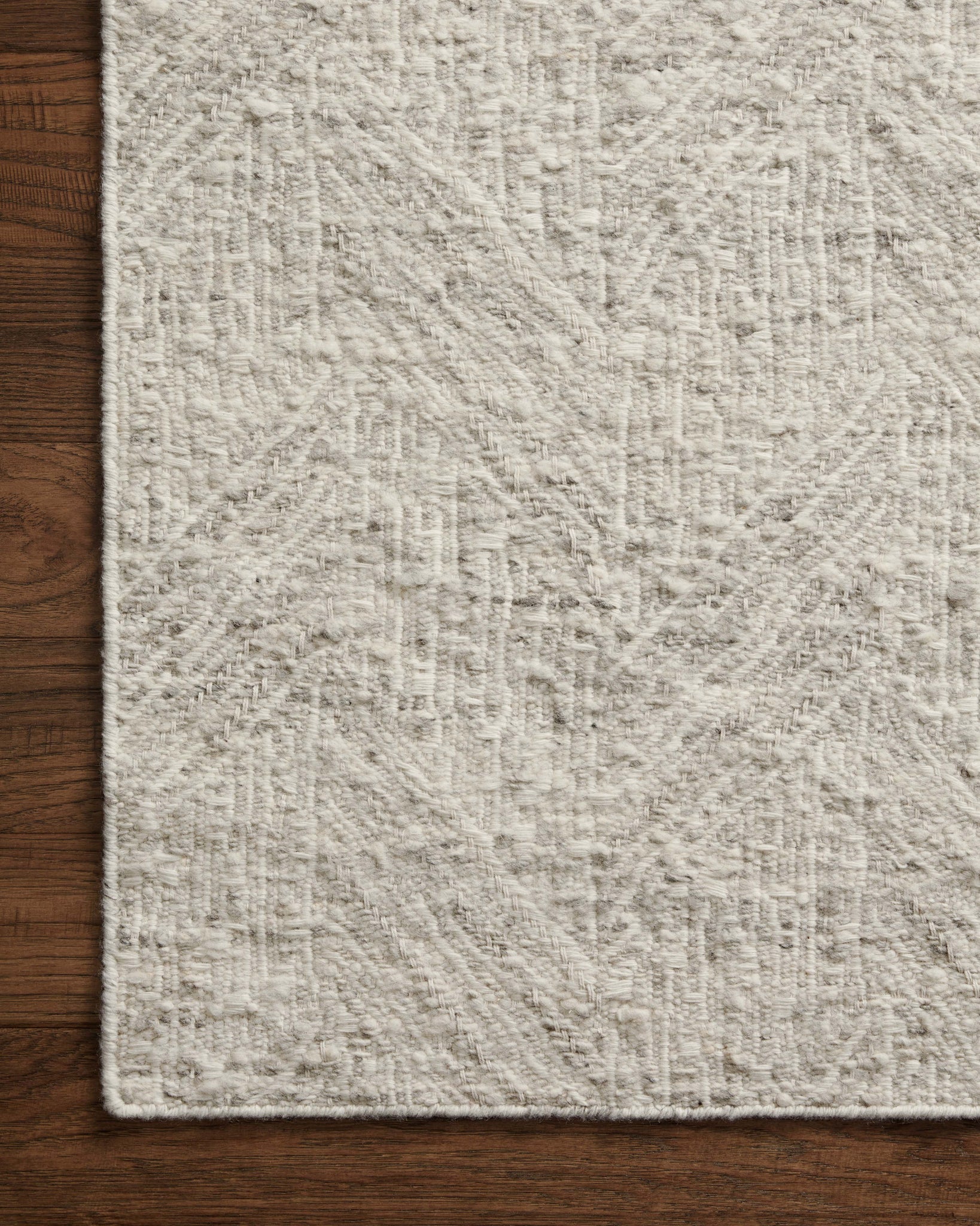 side view of Raven Silver / Ivory luxury Rug