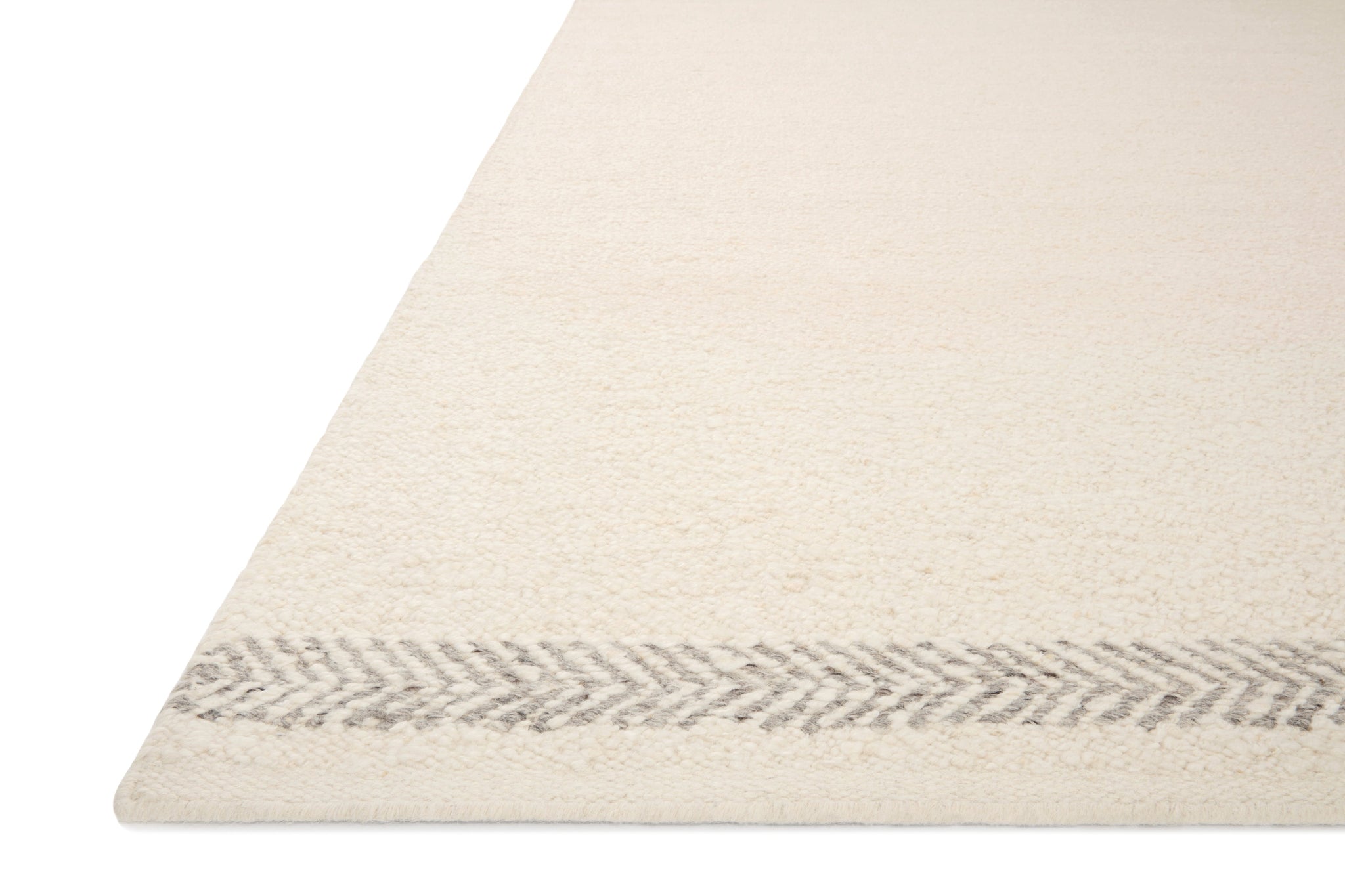angle view of Reyla Ivory / Silver luxury Rug
