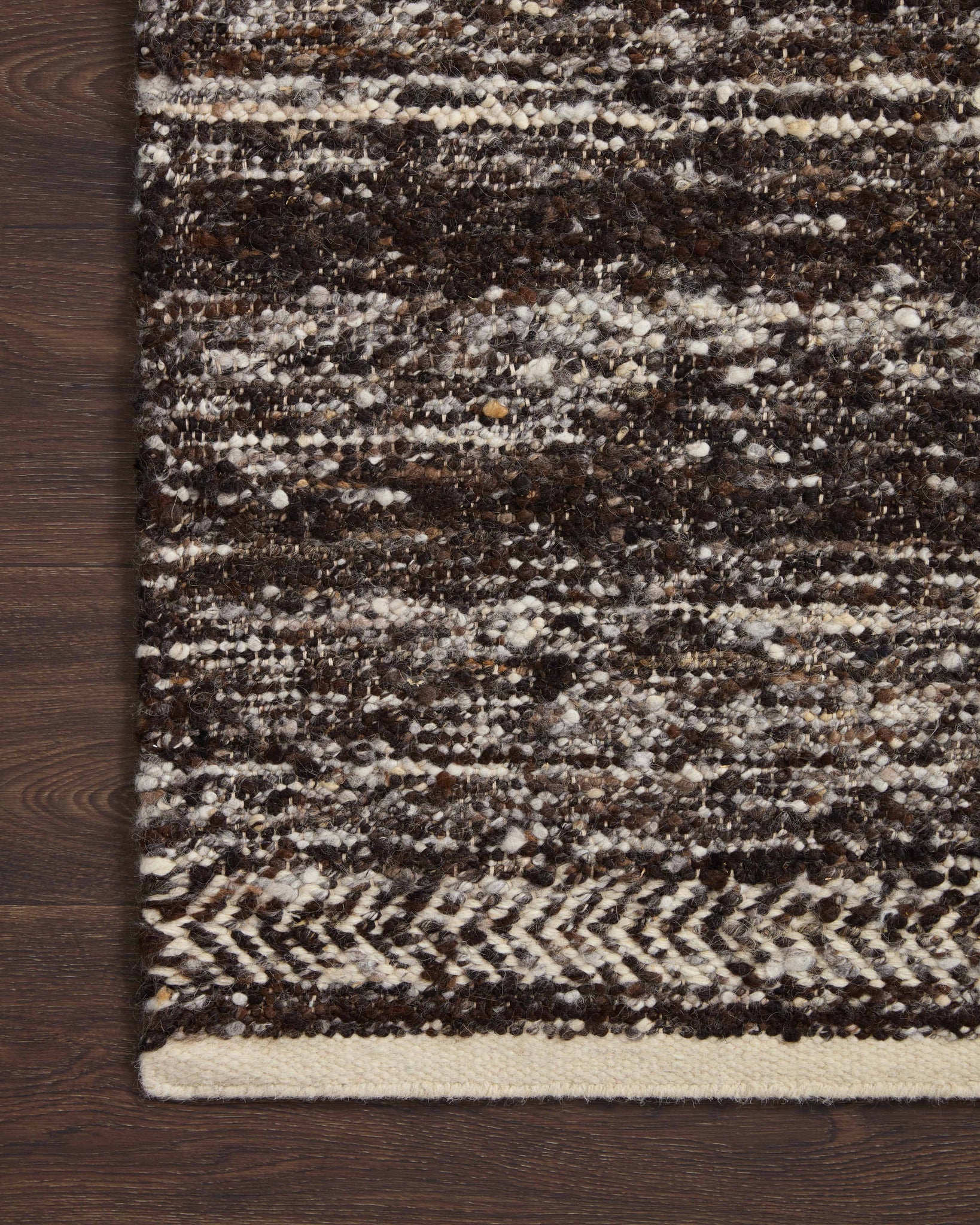 side view of Reyla Mocha / Ivory luxury Rug