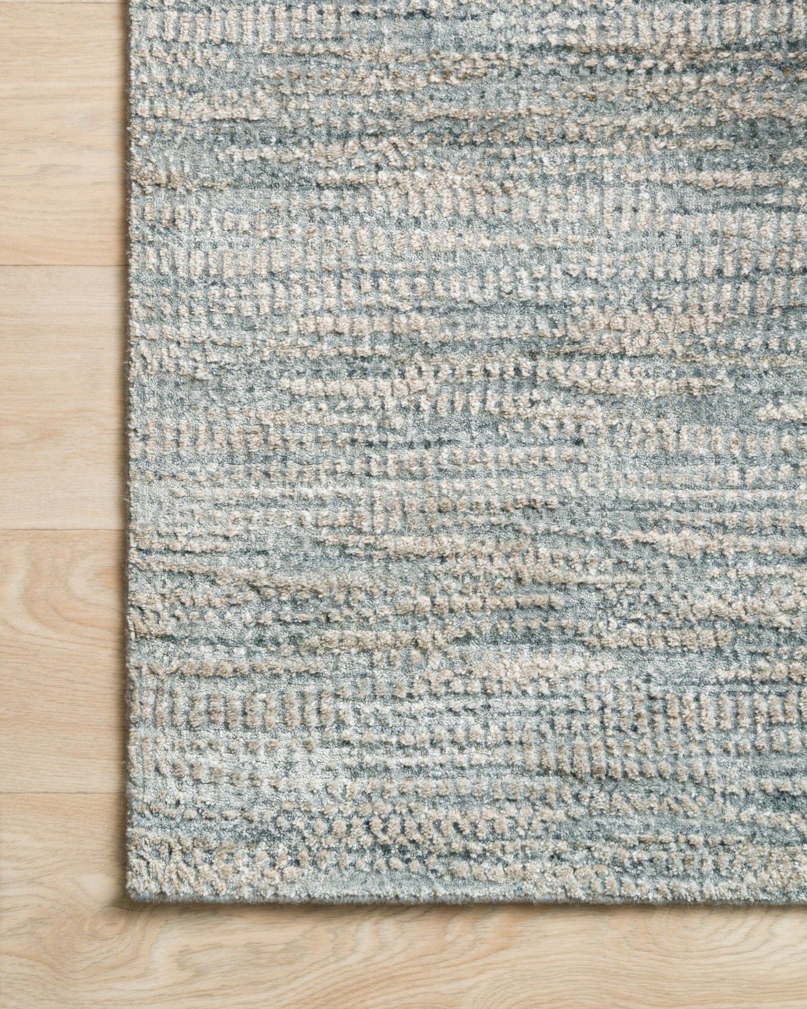 side view of Robin Mist luxury Rug