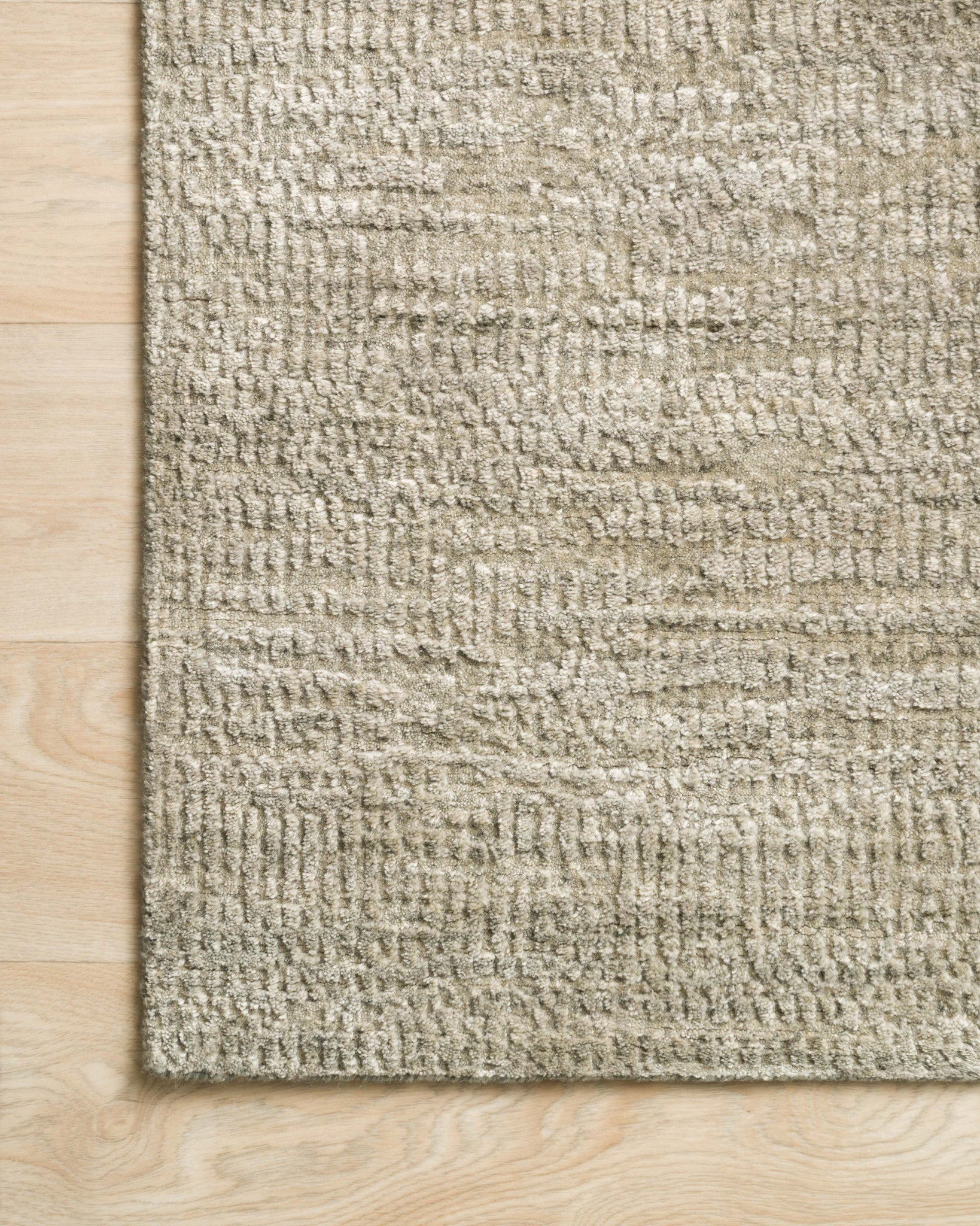 side view of Robin Oatmeal luxury Rug
