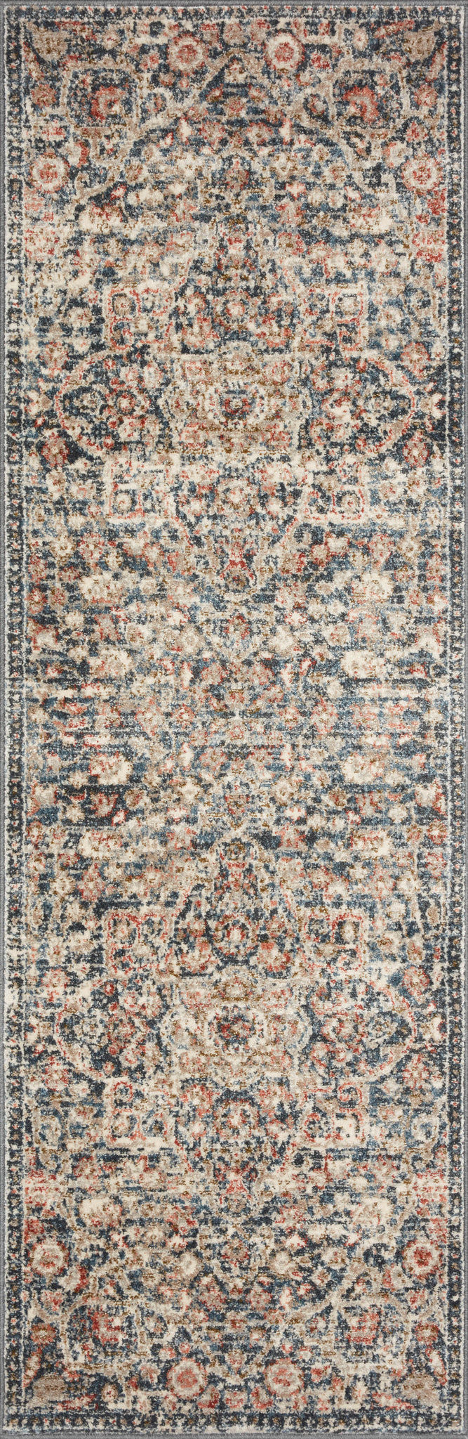 detail view of Saban Blue / Spice luxury Rug