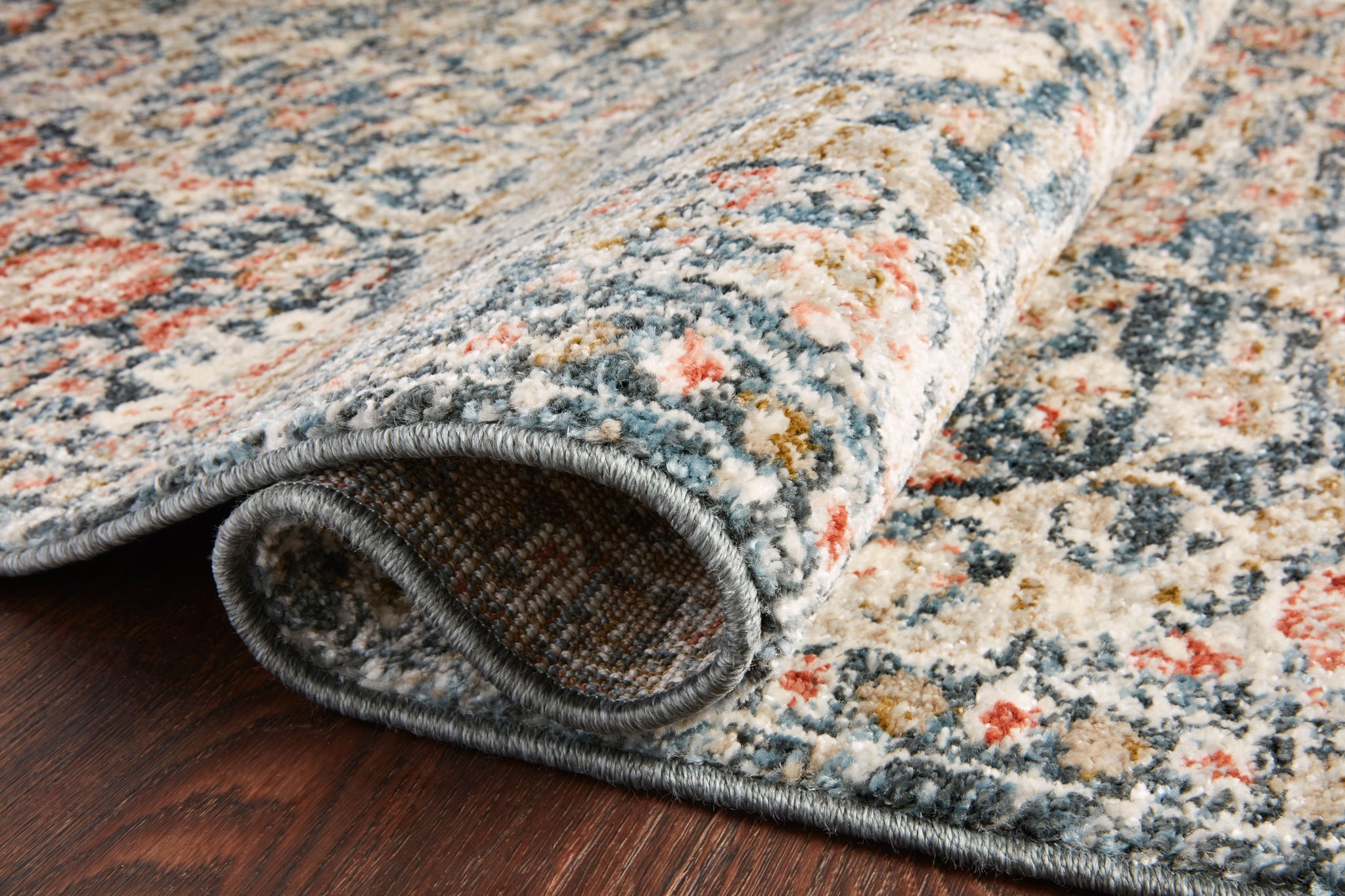 lifestyle view of Saban Blue / Spice luxury Rug