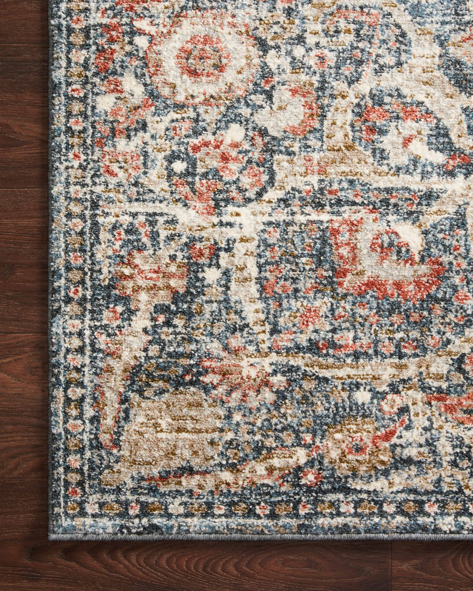 lifestyle view of Saban Blue / Spice luxury Rug