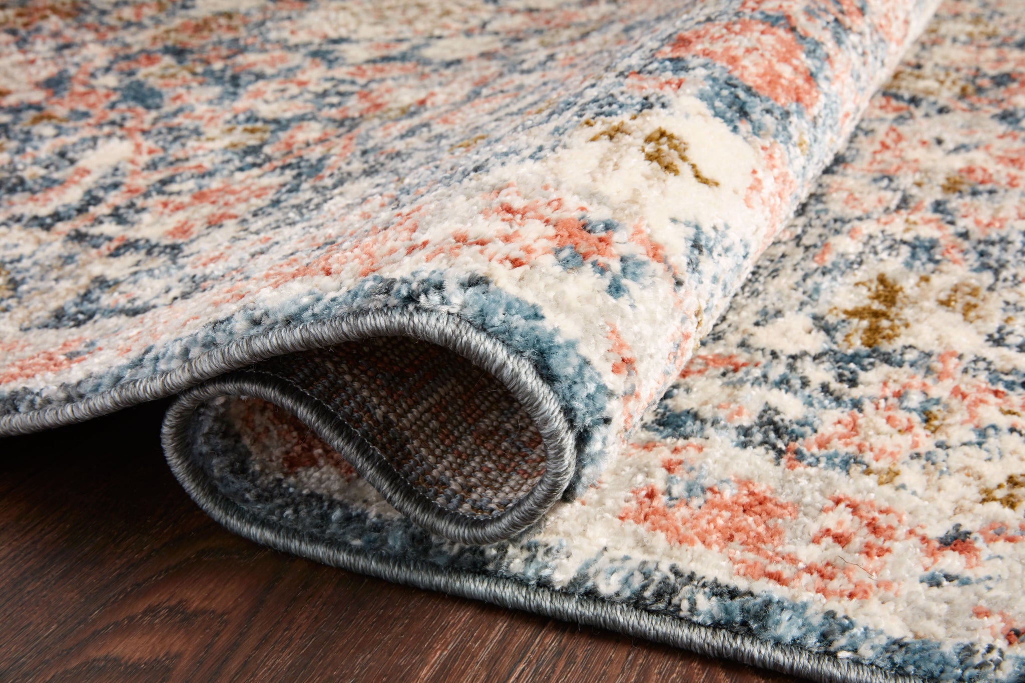 lifestyle view of Saban Navy / Rust luxury Rug