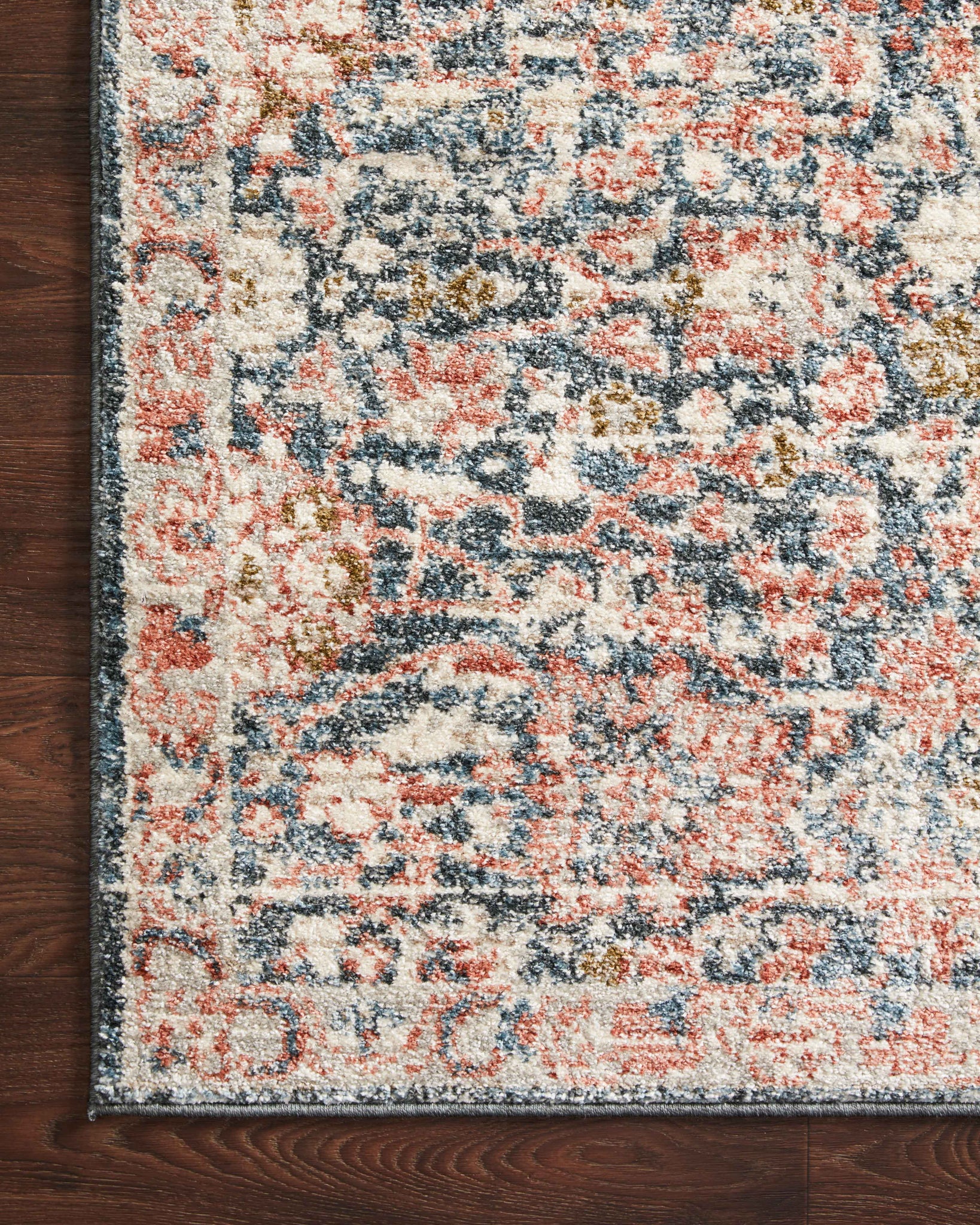 lifestyle view of Saban Navy / Rust luxury Rug