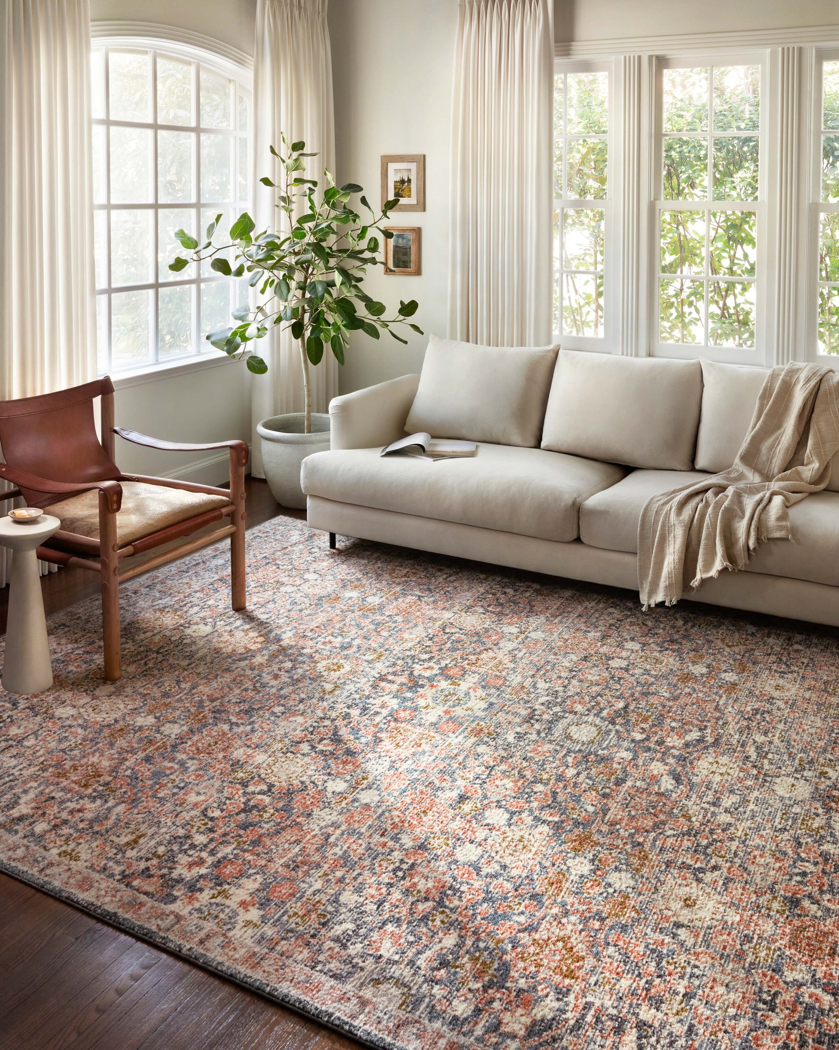 angle view of Saban Navy / Rust luxury Rug