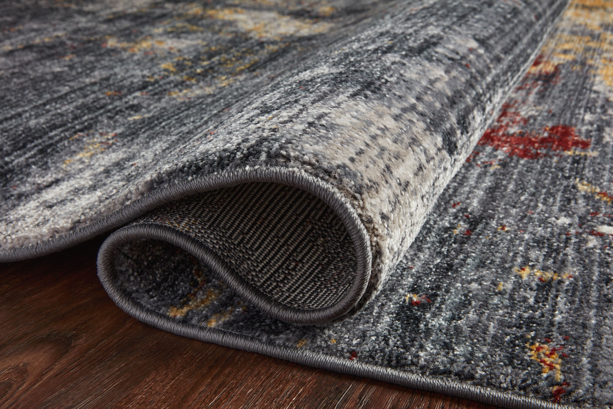 lifestyle view of Samra Dk. Grey / Spice luxury Rug