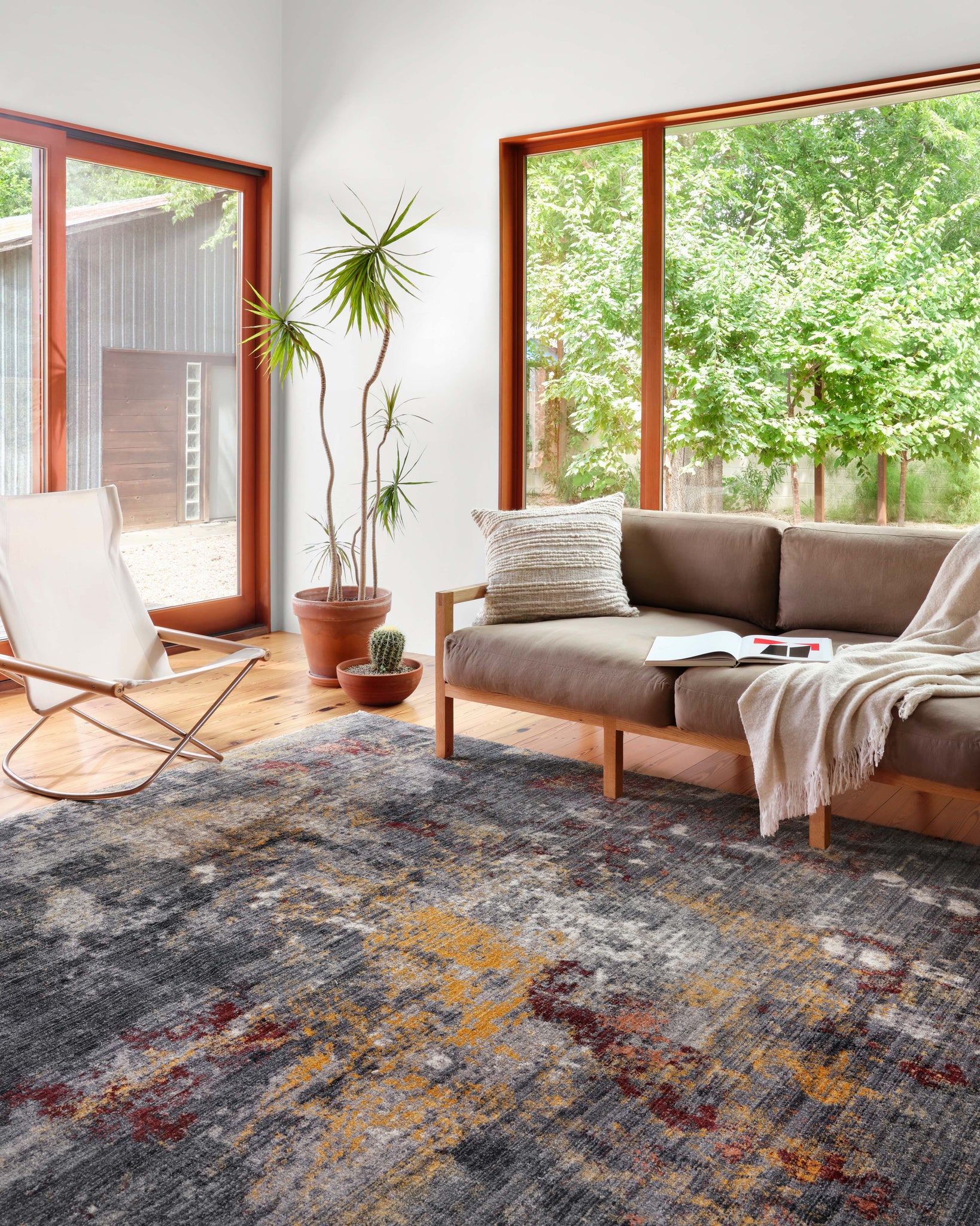 angle view of Samra Dk. Grey / Spice luxury Rug