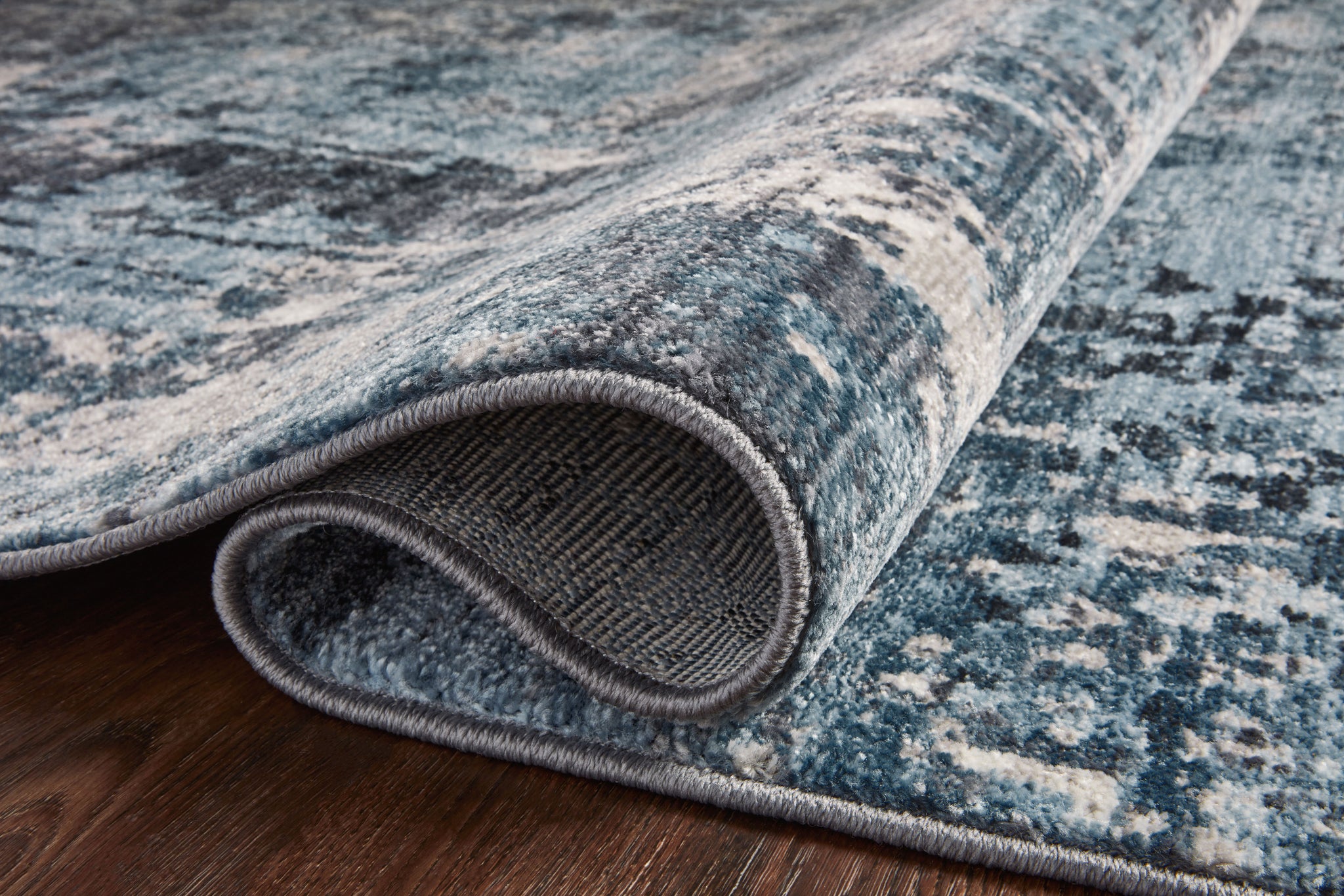 lifestyle view of Samra Charcoal / Sky luxury Rug