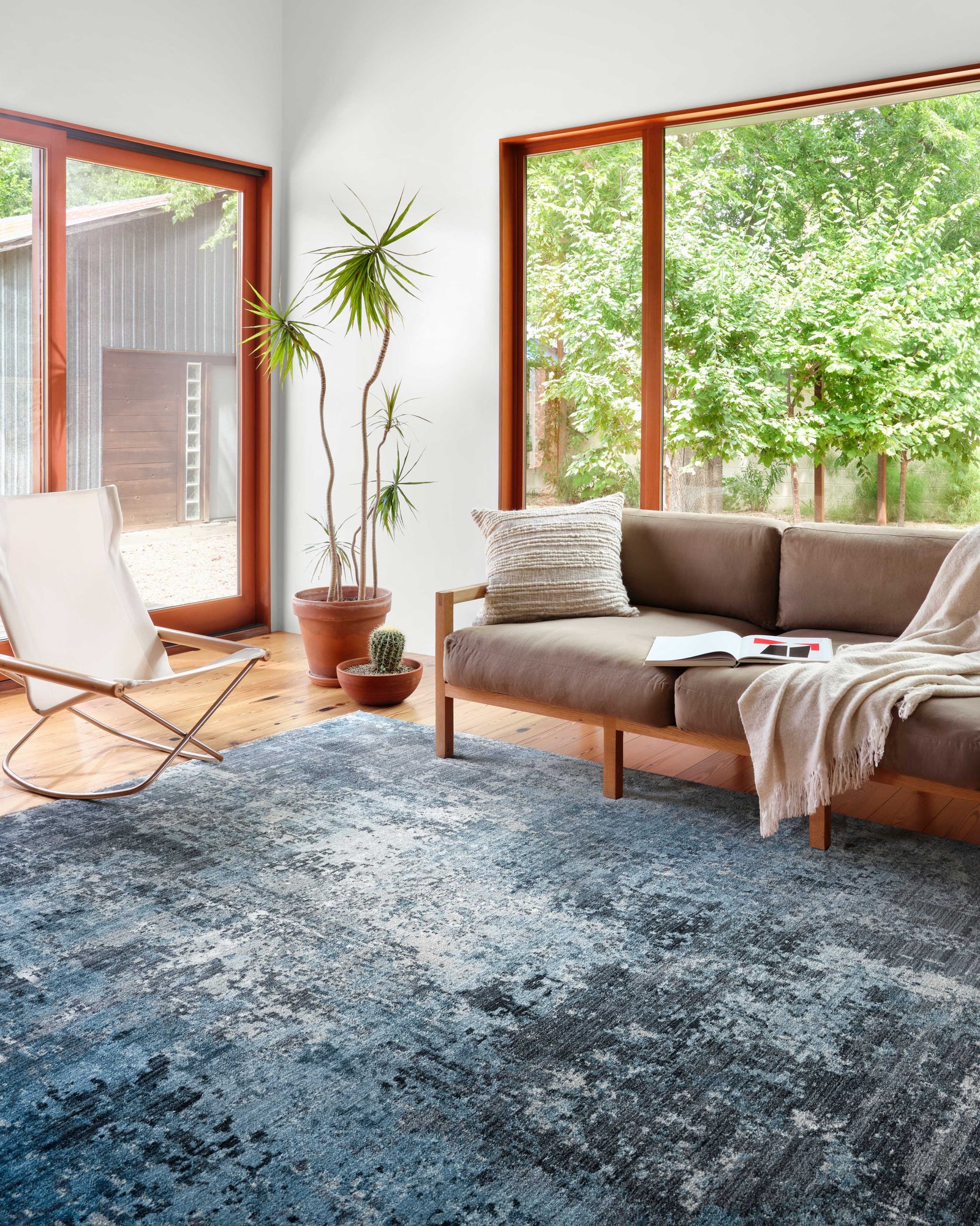 front view of Samra Charcoal / Sky luxury Rug