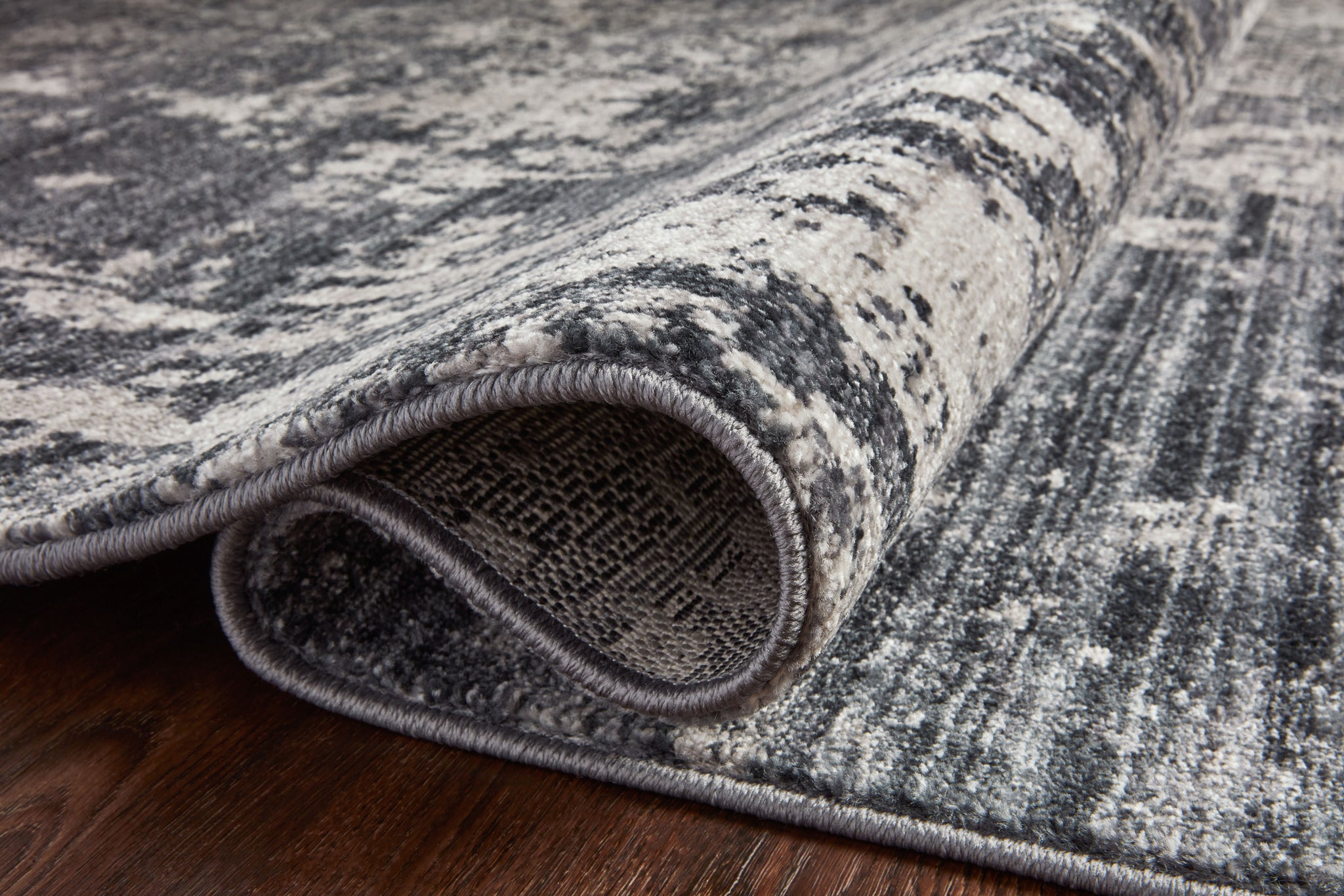 lifestyle view of Samra Charcoal / Silver luxury Rug