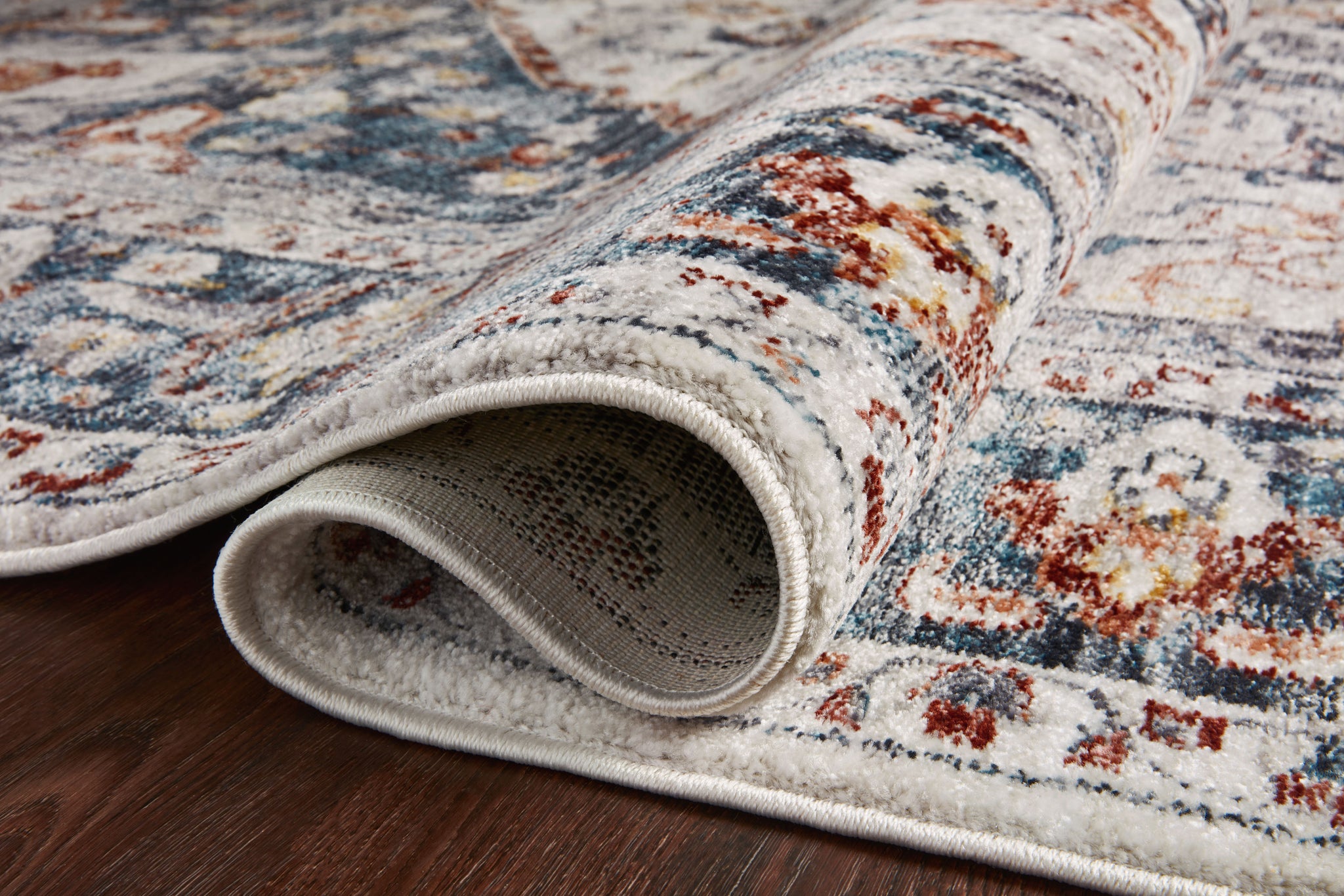 lifestyle view of Samra Ivory / Denim luxury Rug