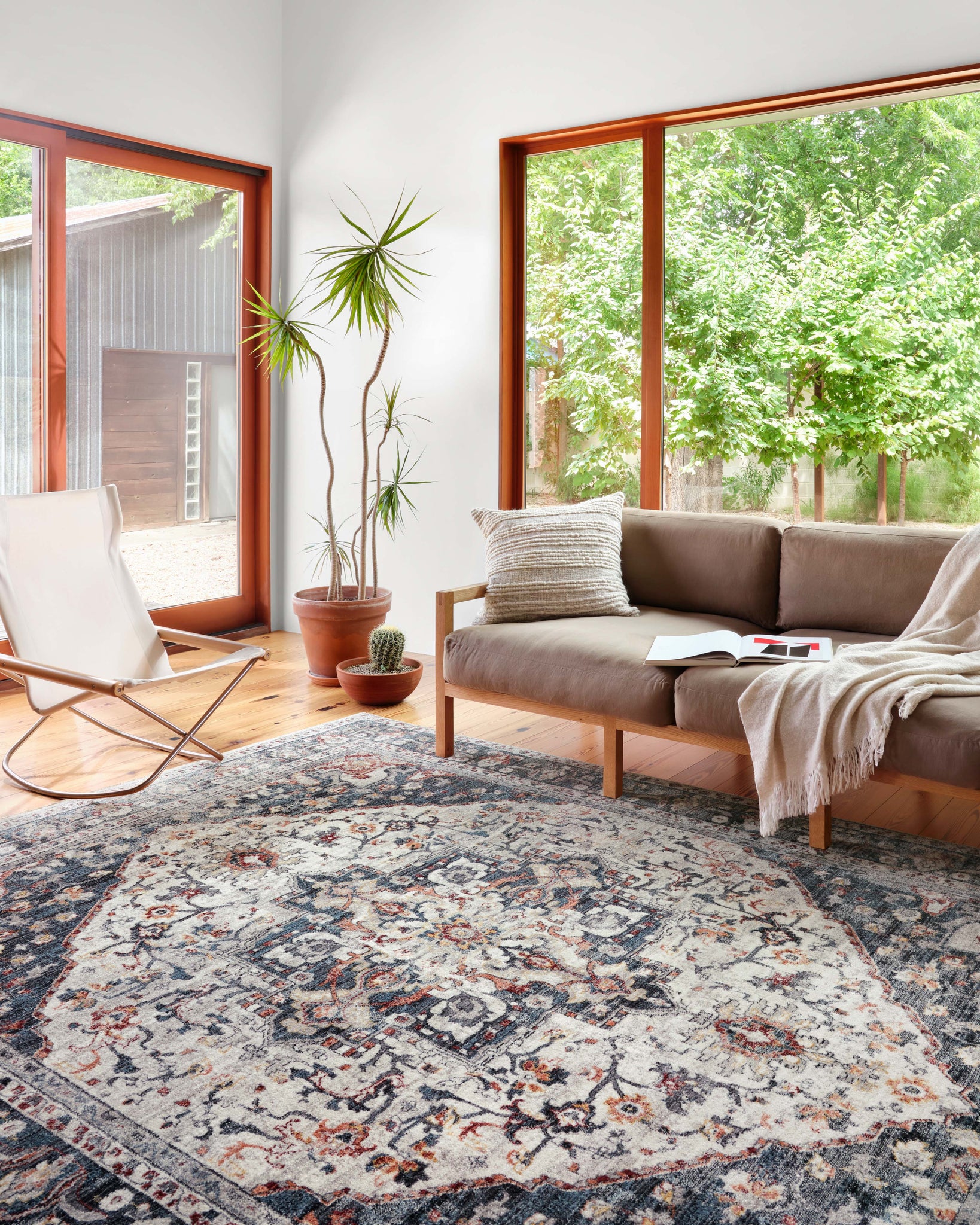 angle view of Samra Ivory / Denim luxury Rug