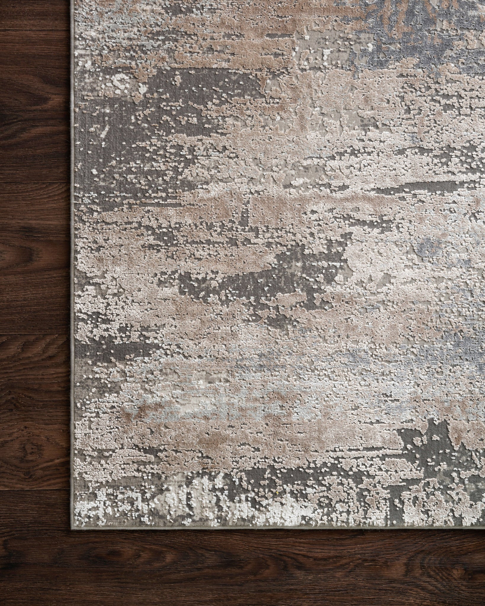 side view of Sienne Ivory / Sand luxury Rug