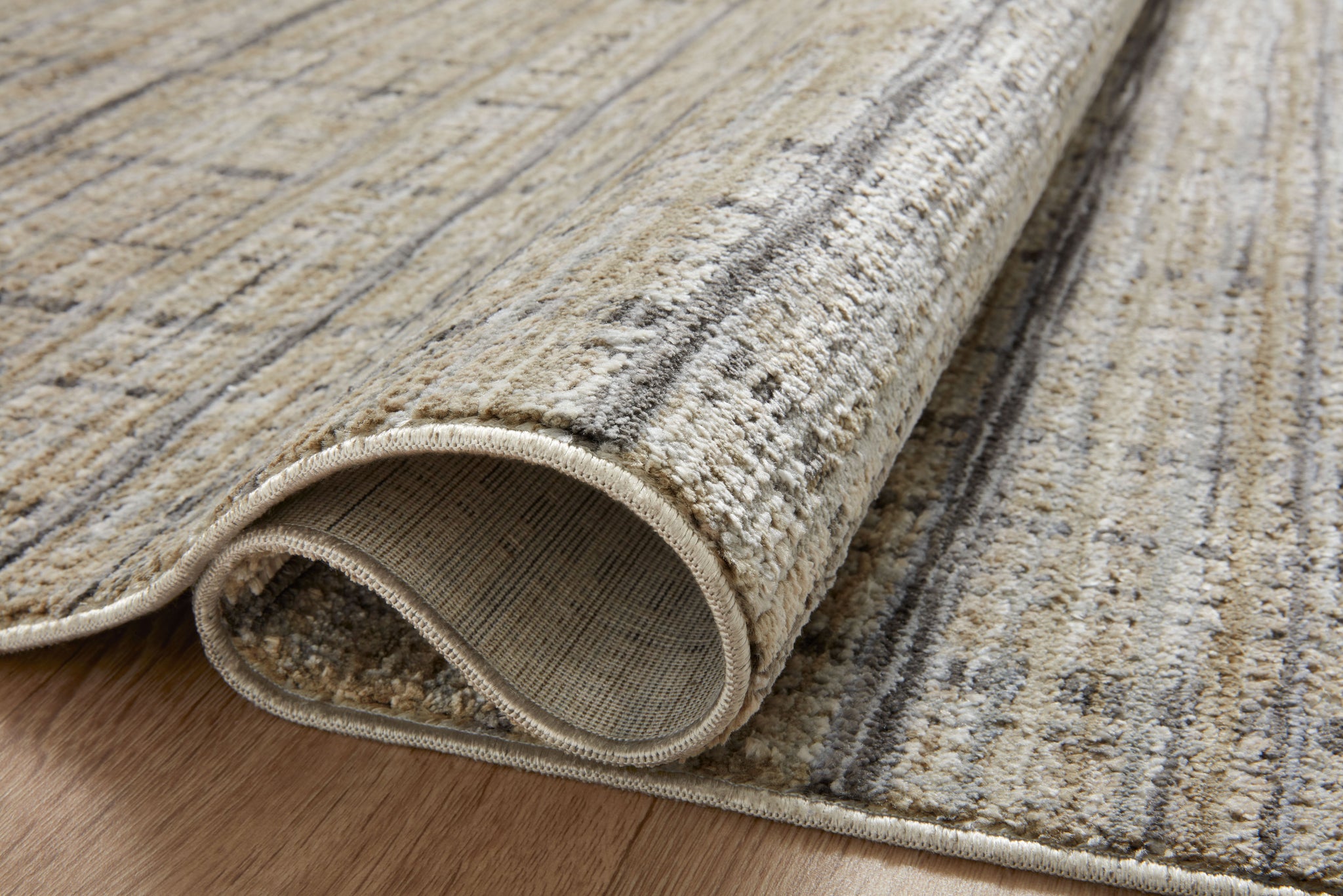 detail view of Soho Pebble / Charcoal luxury Rug