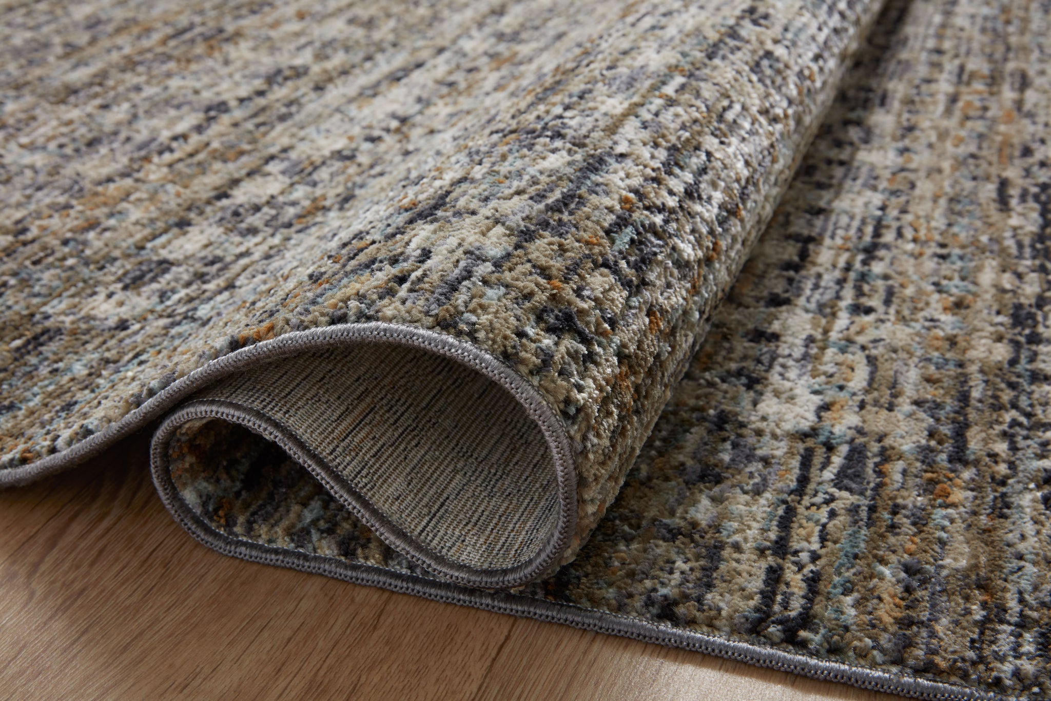 detail view of Soho Charcoal / Multi luxury Rug