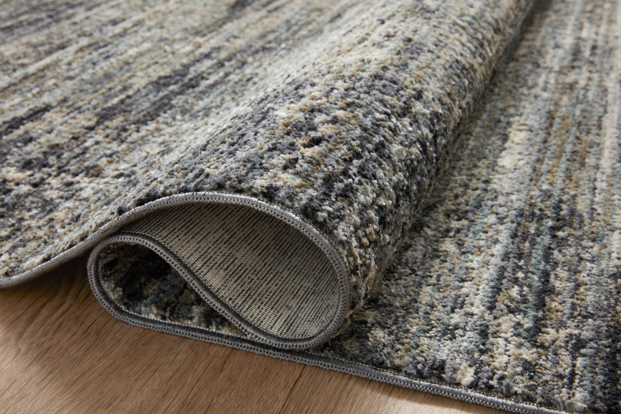 detail view of Soho Multi / Slate luxury Rug