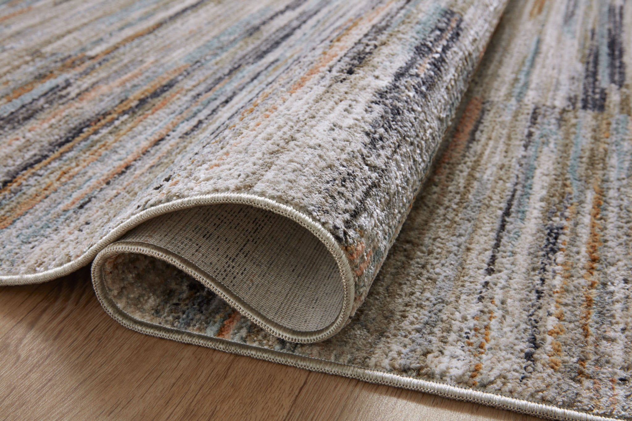 detail view of Soho Multi / Dove luxury Rug