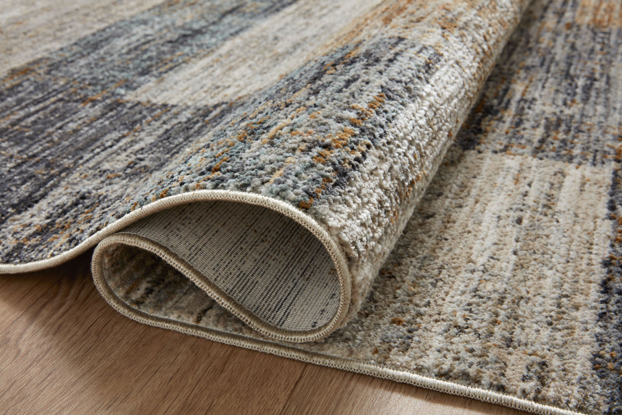 detail view of Soho Grey / Gold luxury Rug