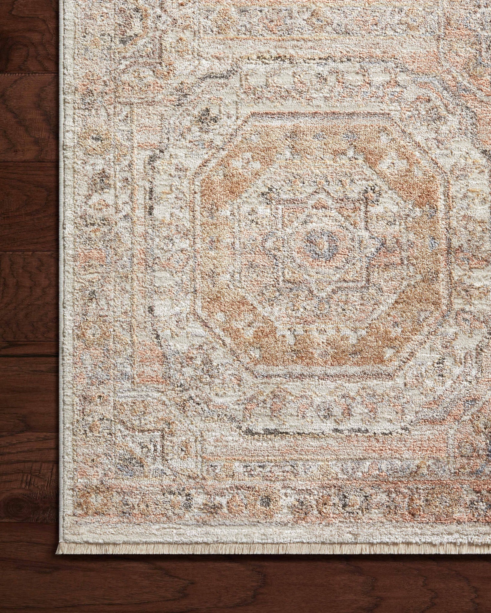 side view of Sonnet Apricot / Multi luxury Rug