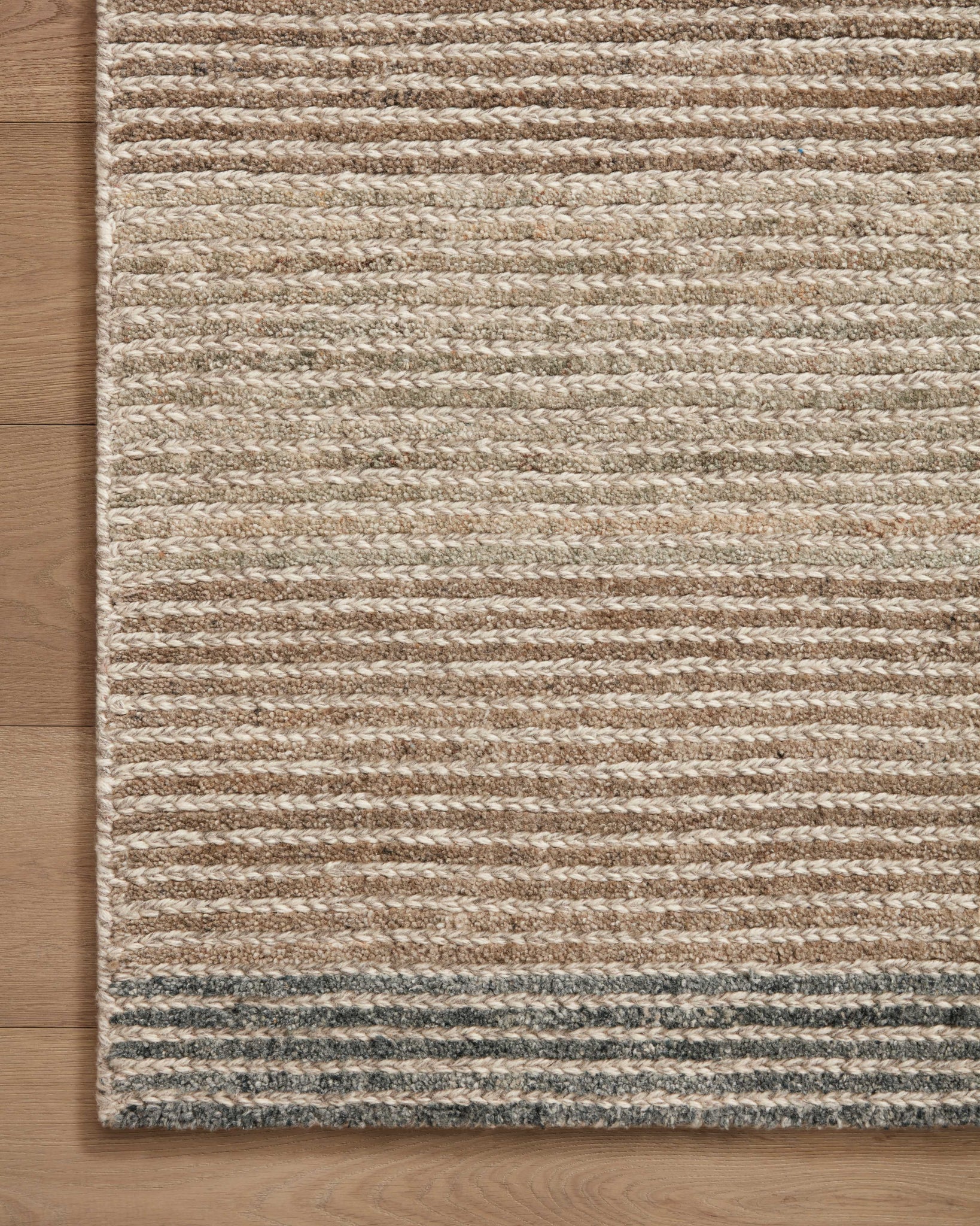 side view of Stiles Beige / Slate luxury Rug