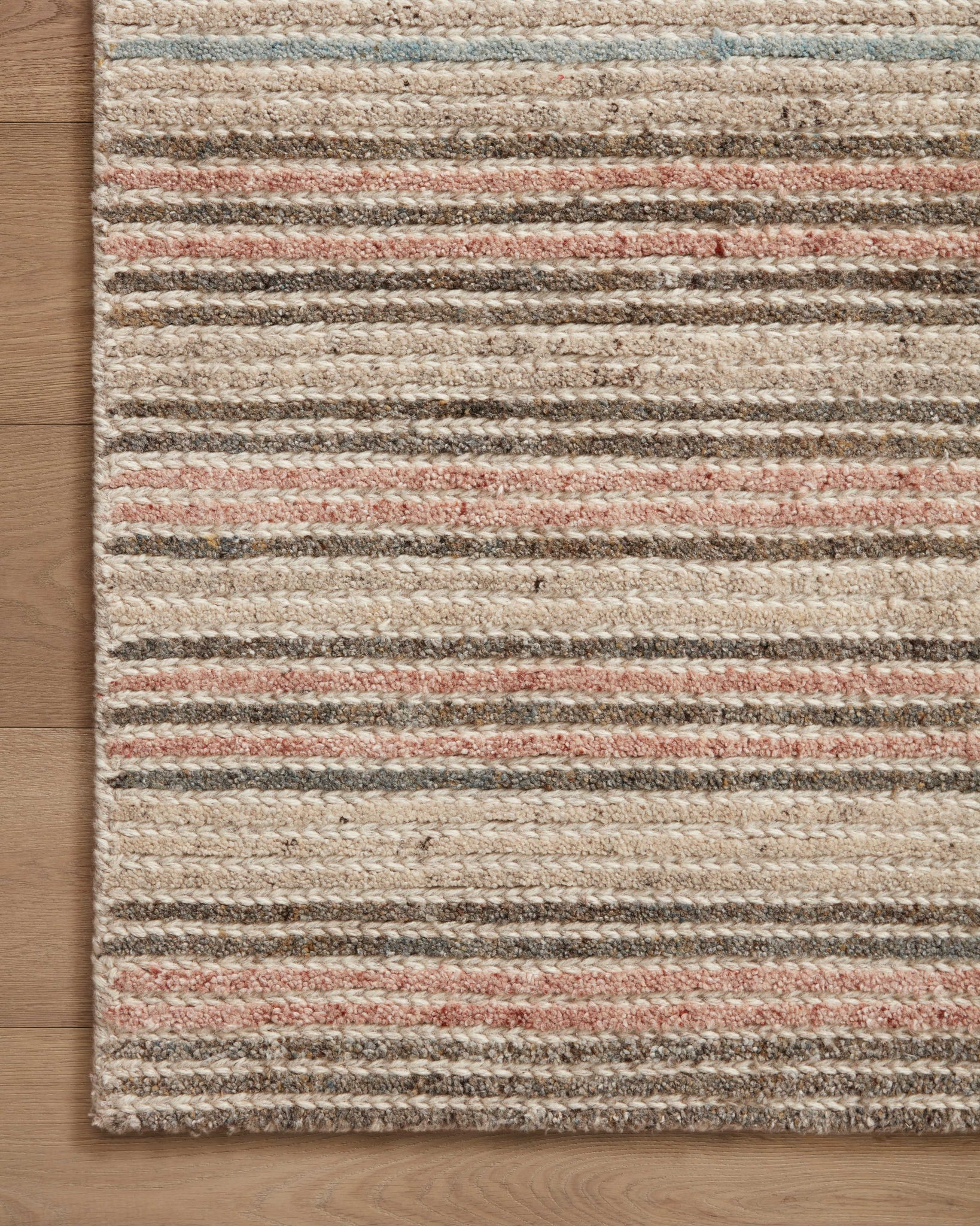 side view of Stiles Beige / Multi luxury Rug