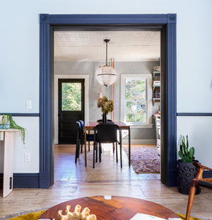 Sphere No. 3 Pendant 18.25" in dark bronze styled in a bright kitchen for warm, layered light at Laurie Yapp Home.