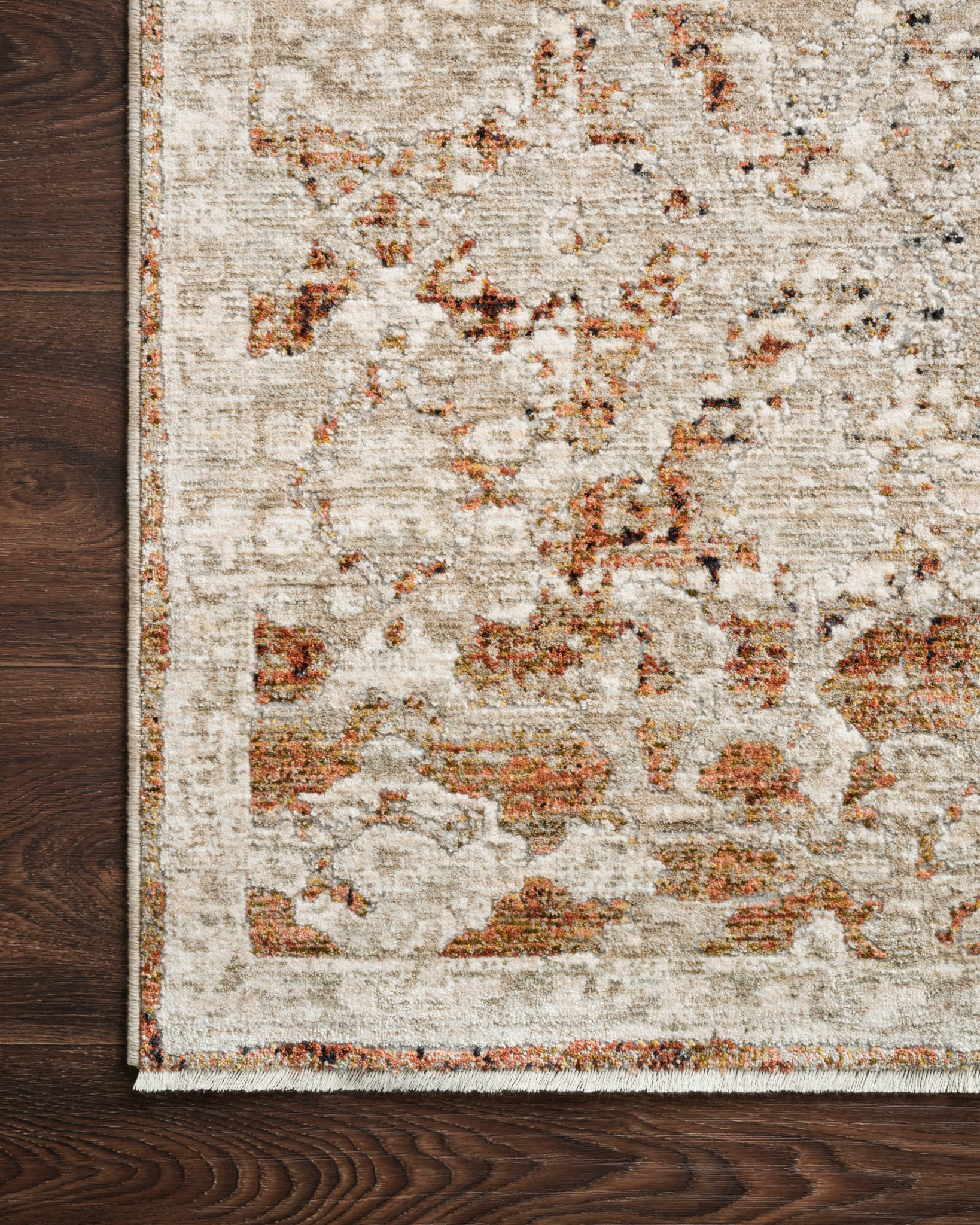detail view of Theia Natural / Rust luxury Rug