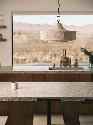 Thurso Pendant 18.75" styled in a welcoming entryway for warm, layered light at Laurie Yapp Home.