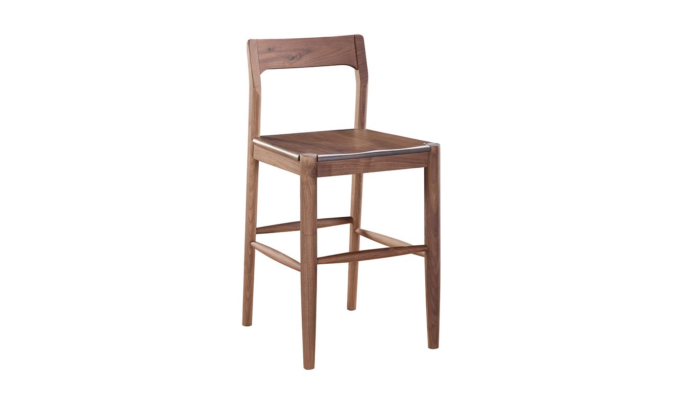lifestyle view of Owing Counter Stool Walnut luxury Chair