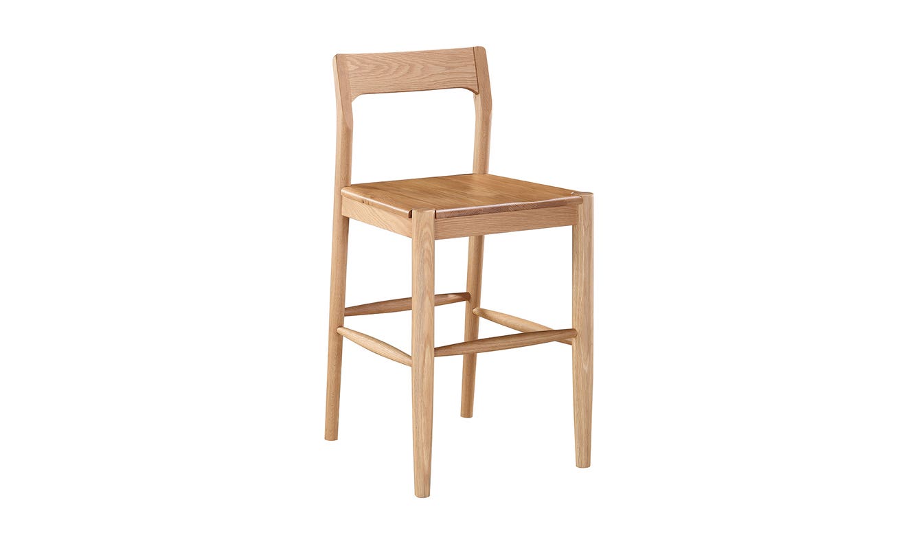 lifestyle view of Owing Counter Stool Natural Oak luxury Chair