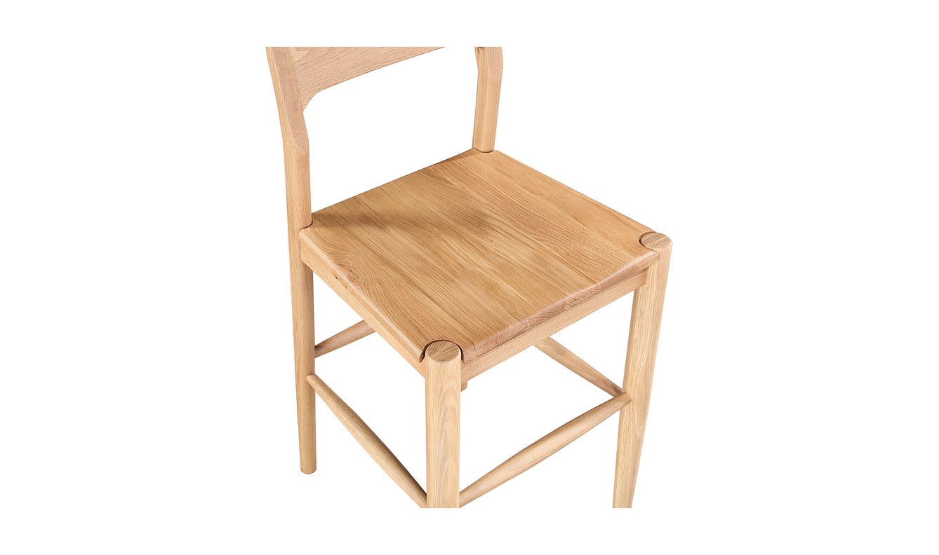 lifestyle view of Owing Counter Stool Natural Oak luxury Chair